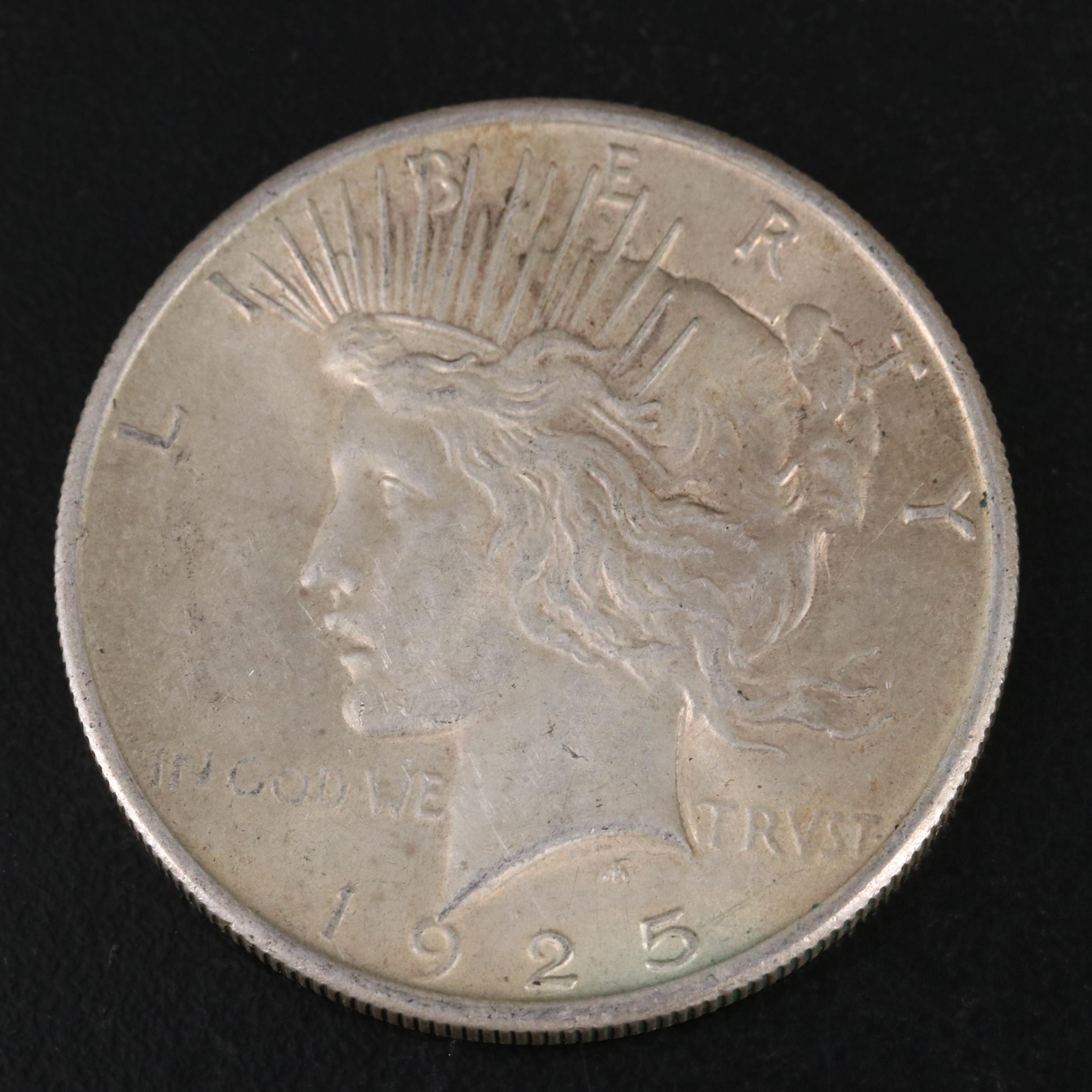 Three Different United States Peace Dollars with a 1925