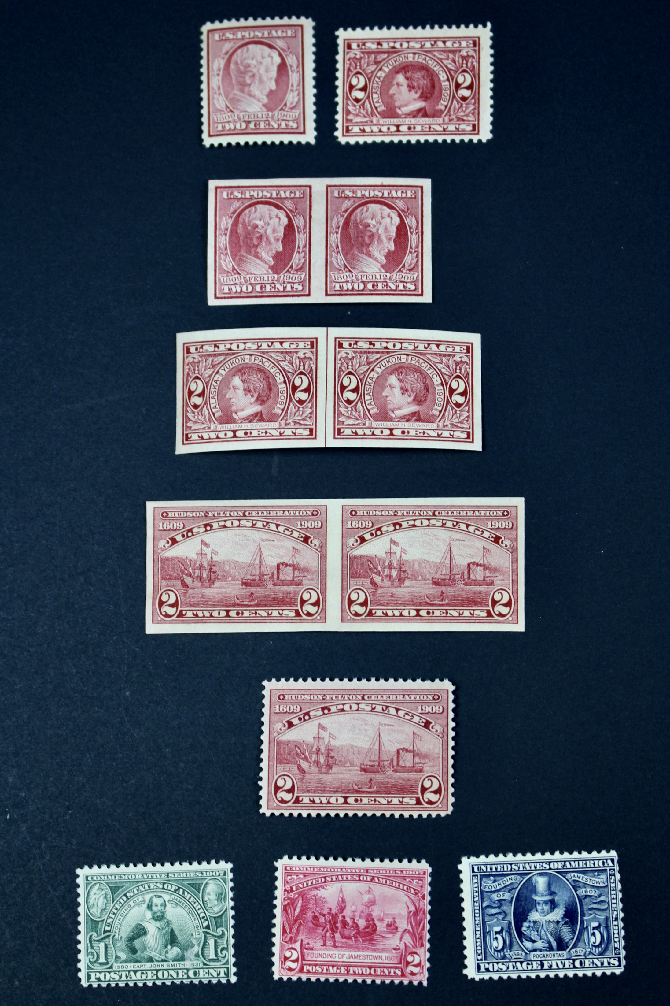 Twelve Early U.S. Postage Stamps, 1907 to 1909