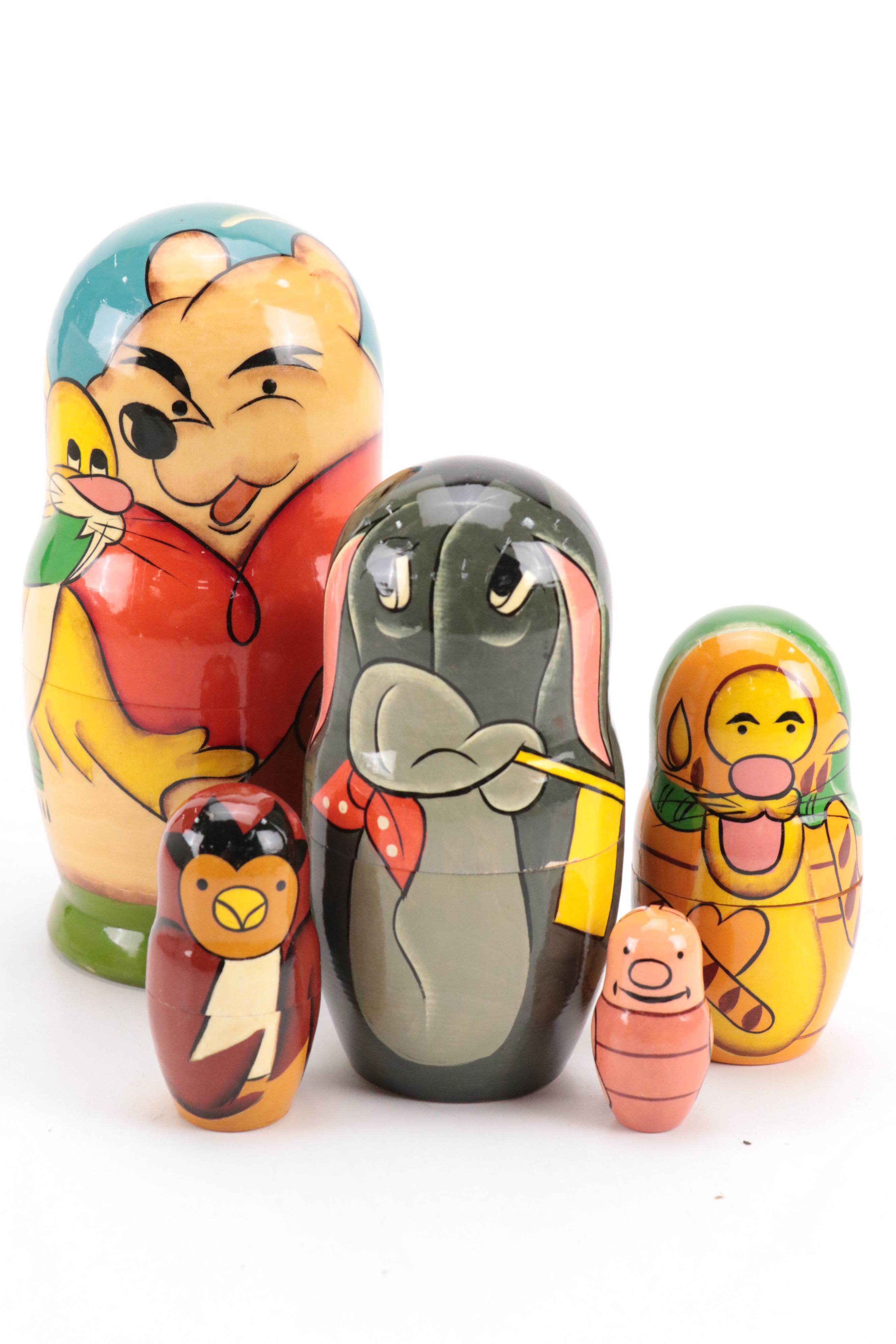 Winnie-the-Pooh Hand-Painted Russian Wooden Nesting Dolls and Disney Snow Globe