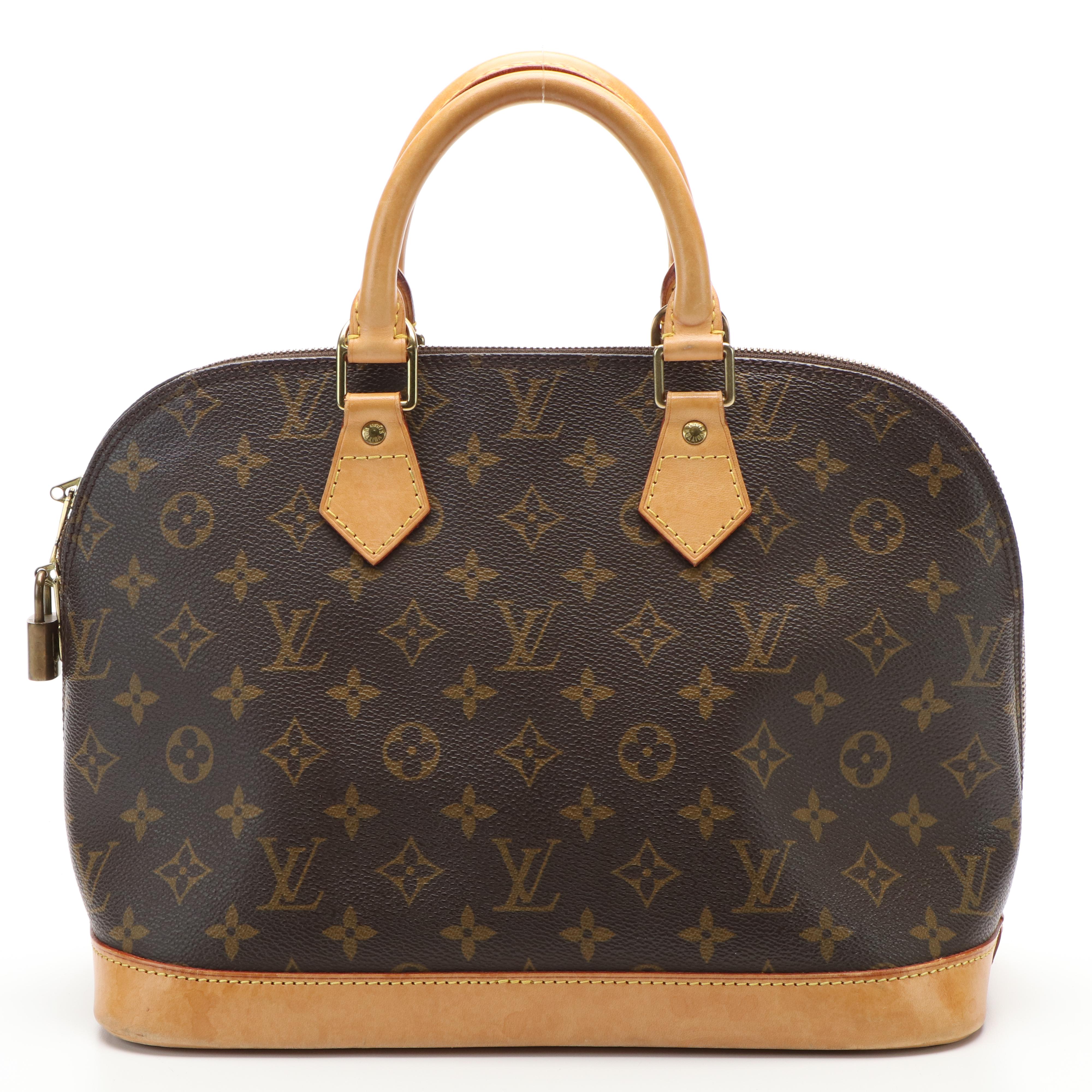 Louis Vuitton Alma PM Bag in Monogram Coated Canvas and Vachetta Leather