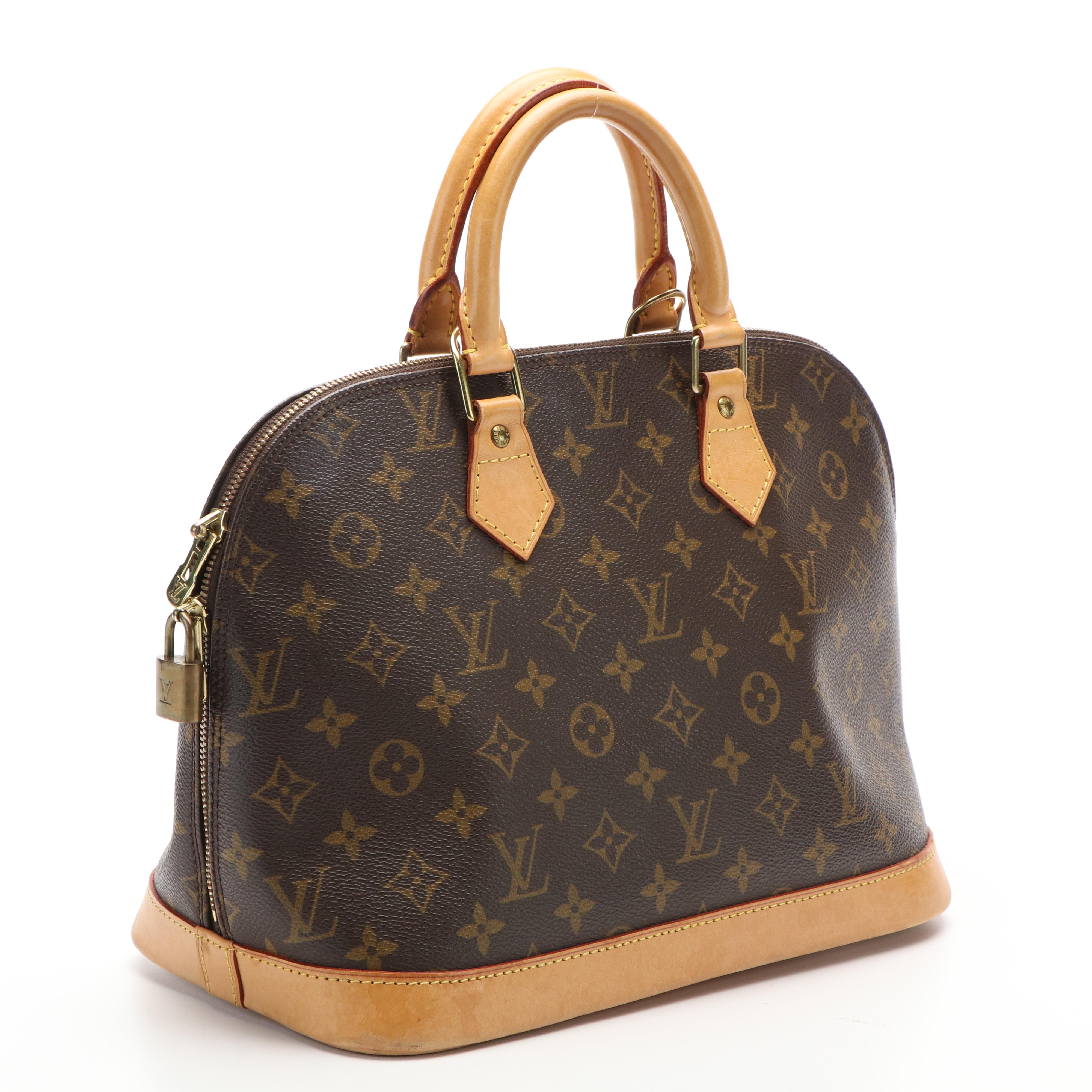 Louis Vuitton Alma PM Bag in Monogram Coated Canvas and Vachetta Leather