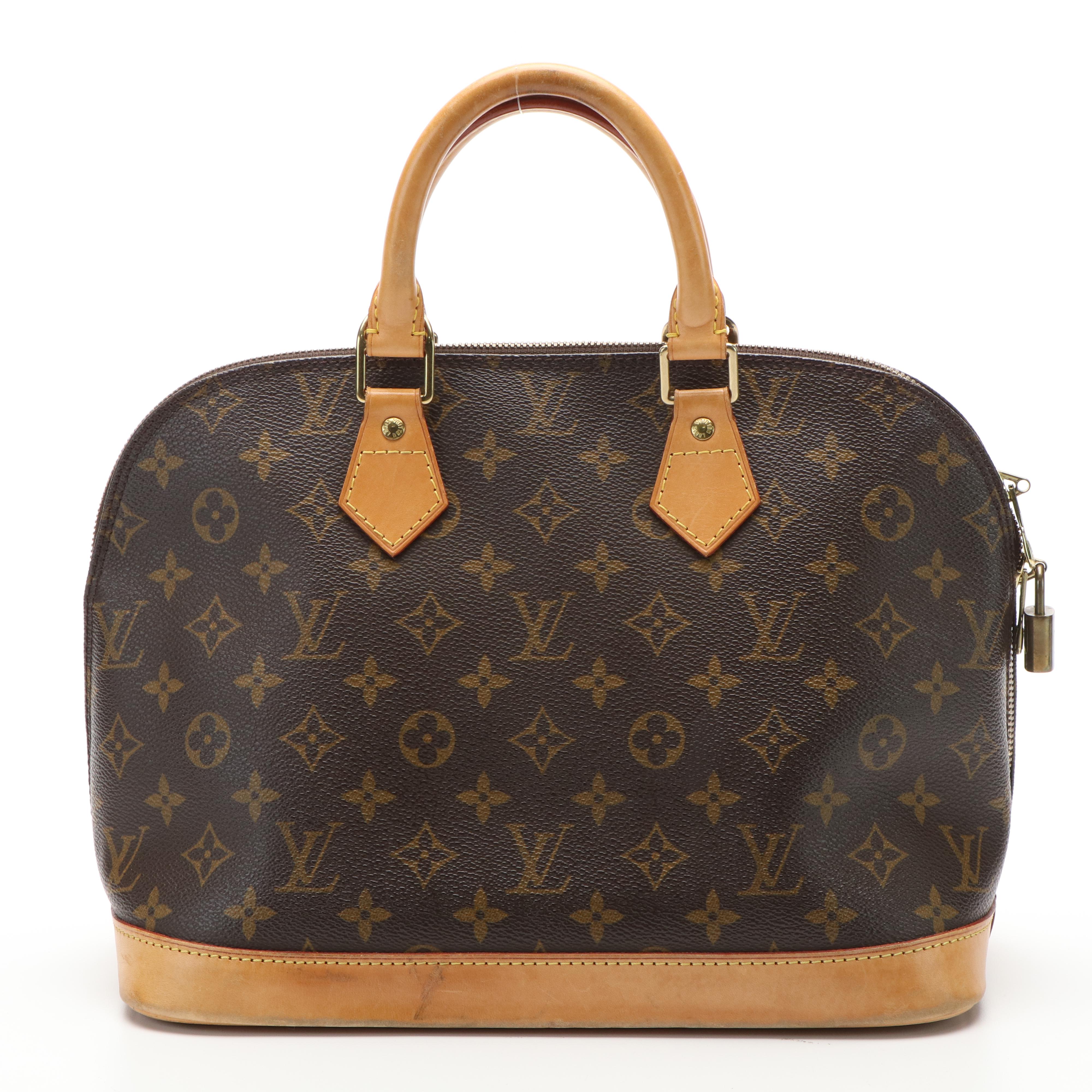 Louis Vuitton Alma PM Bag in Monogram Coated Canvas and Vachetta Leather