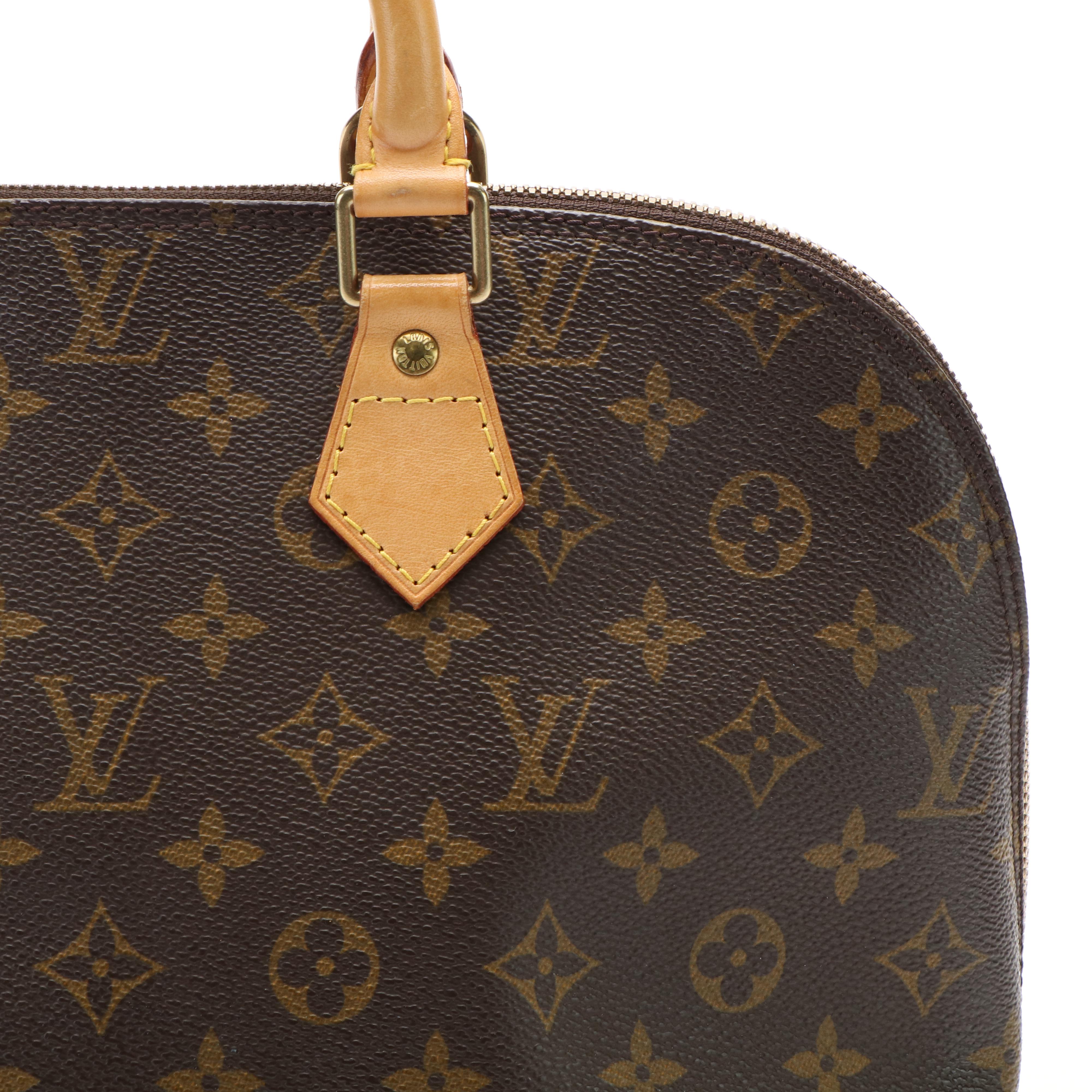 Louis Vuitton Alma PM Bag in Monogram Coated Canvas and Vachetta Leather