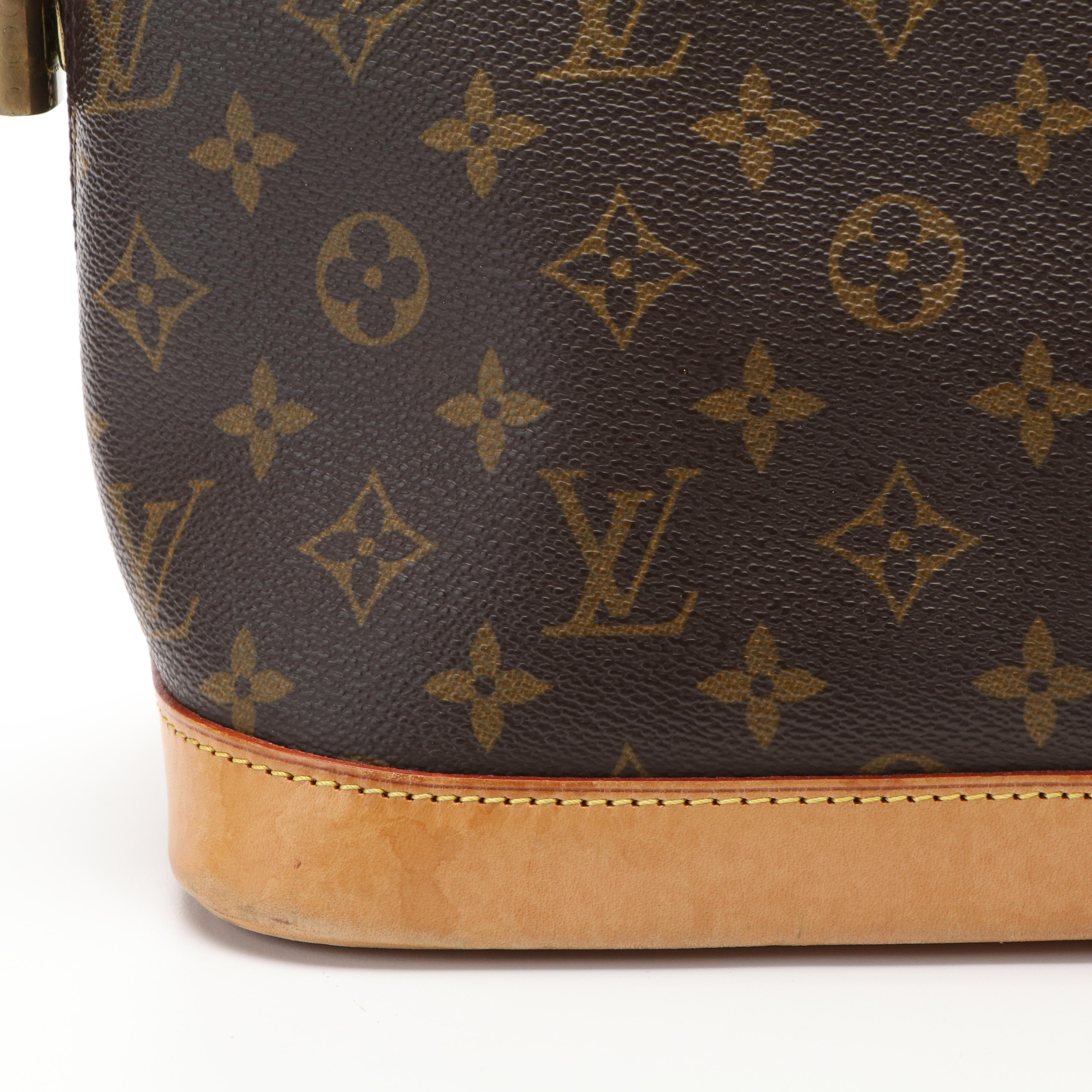 Louis Vuitton Alma PM Bag in Monogram Coated Canvas and Vachetta Leather