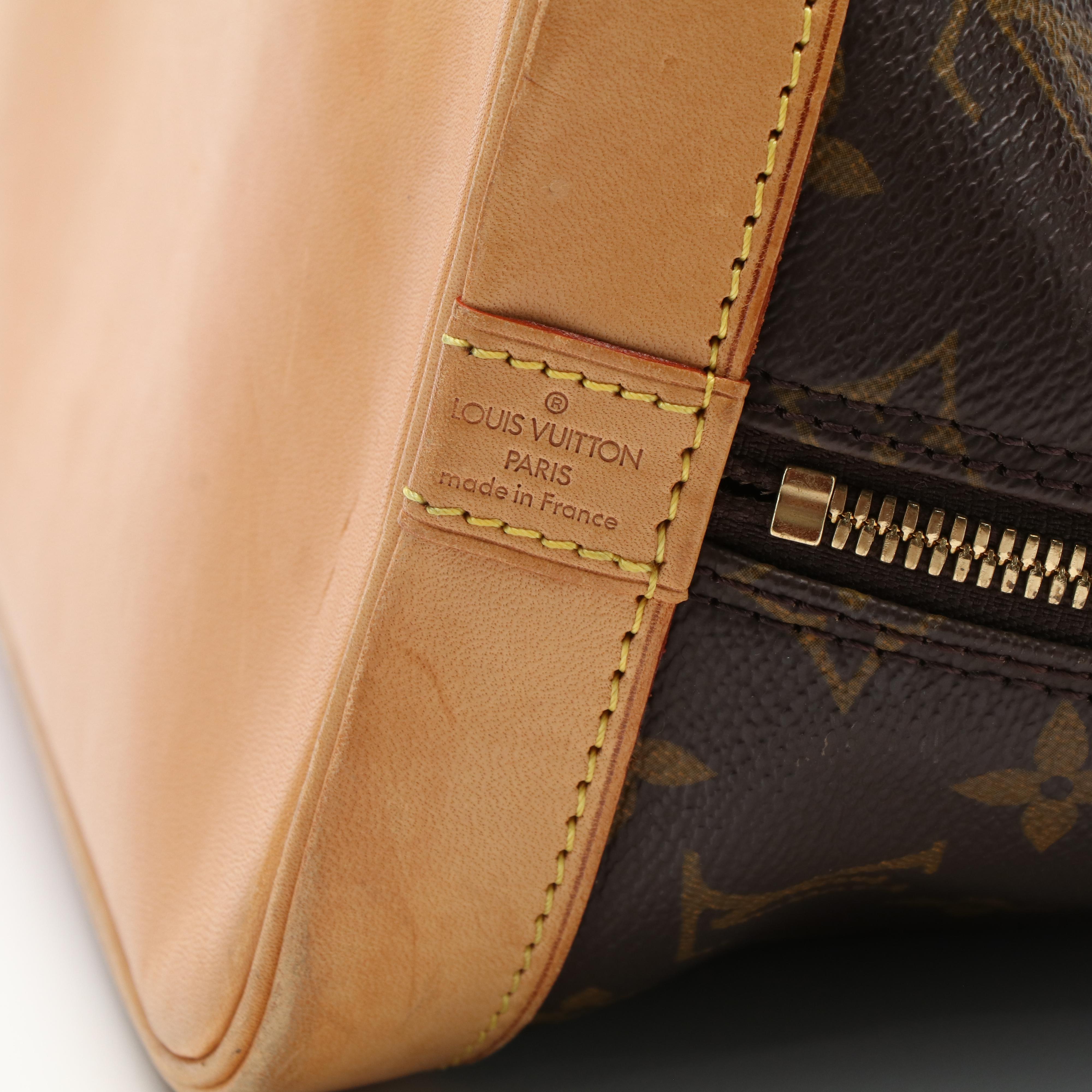 Louis Vuitton Alma PM Bag in Monogram Coated Canvas and Vachetta Leather