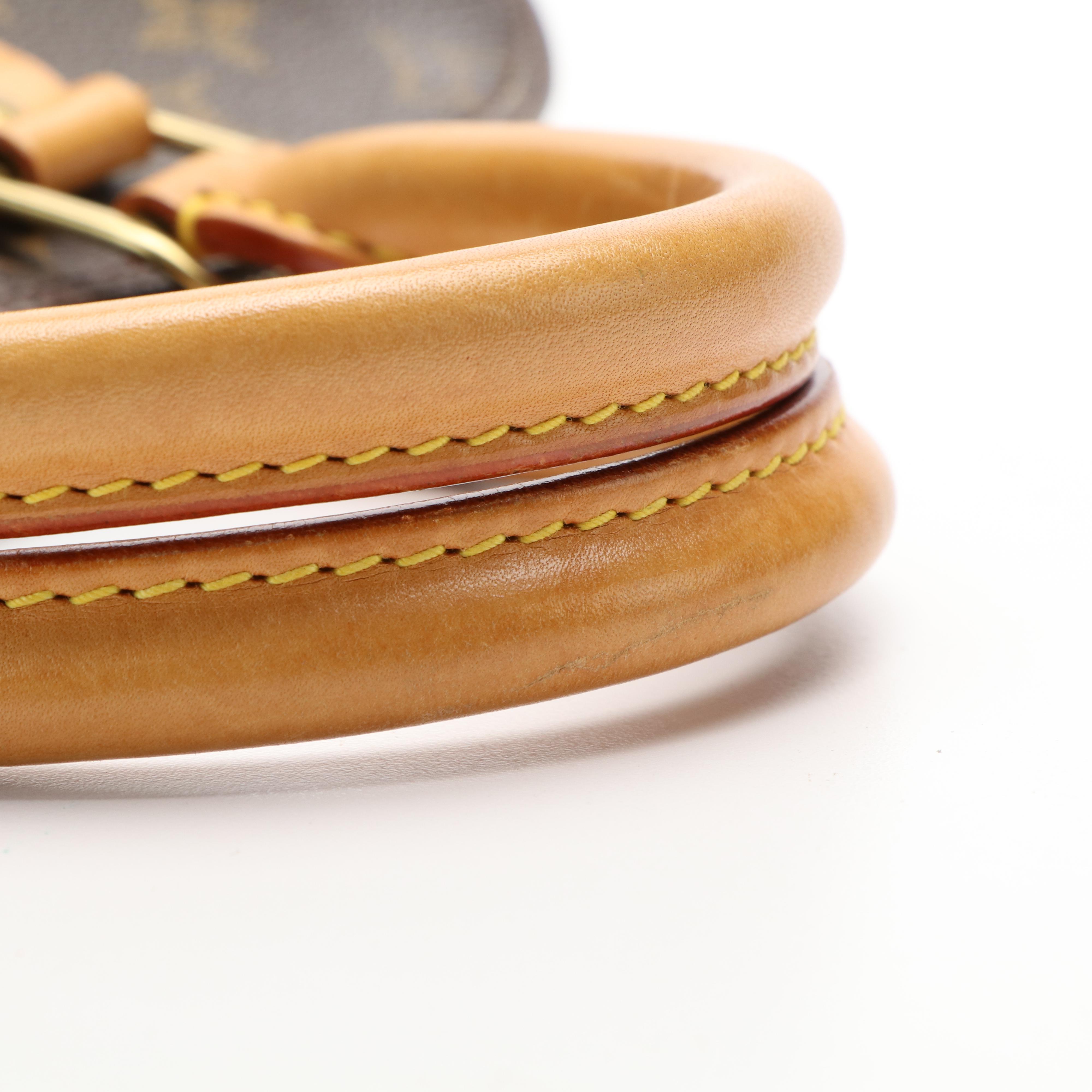 Louis Vuitton Alma PM Bag in Monogram Coated Canvas and Vachetta Leather