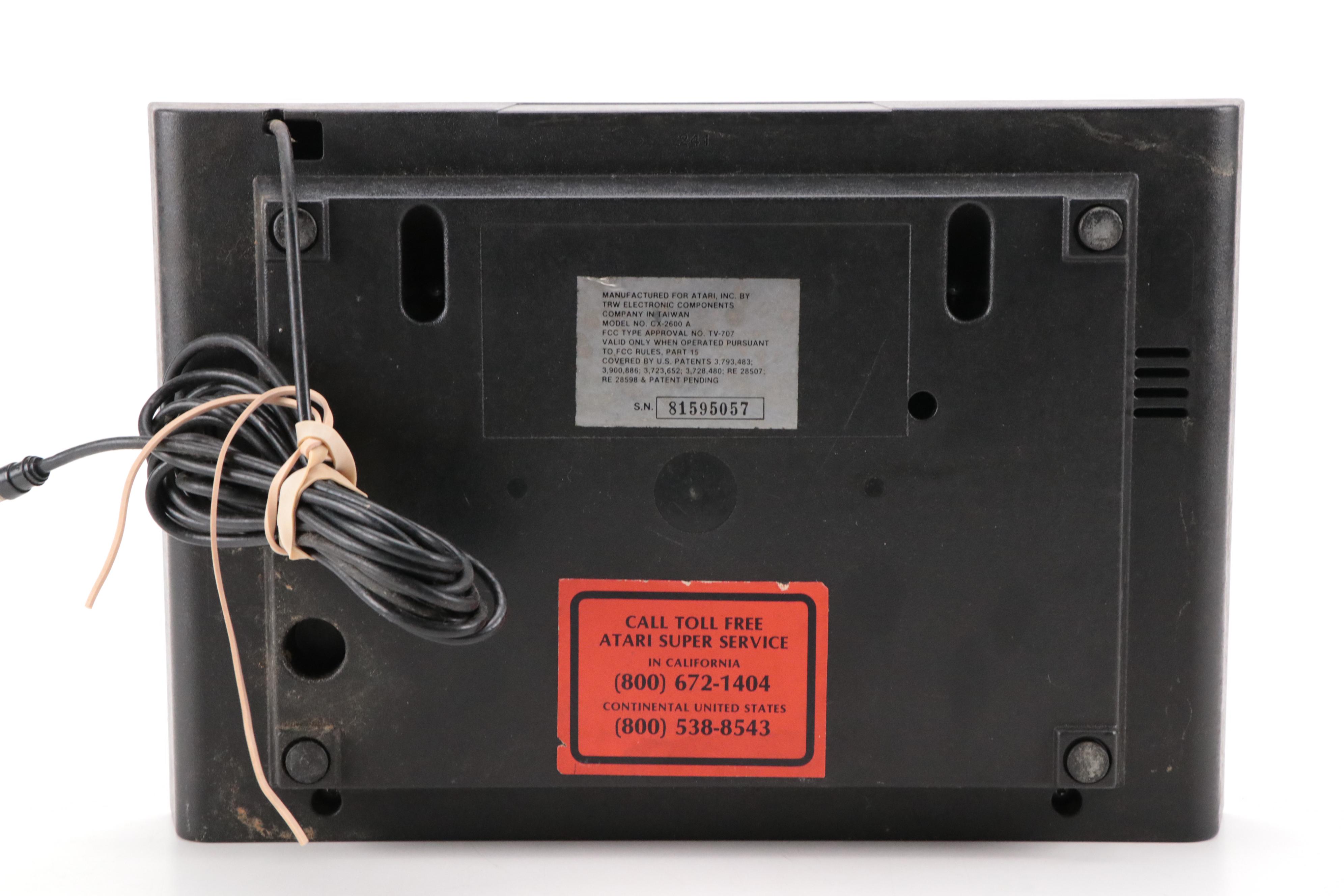 Atari 2600 Console with "Donkey Kong", "Frogger", "Pac-Man", and More