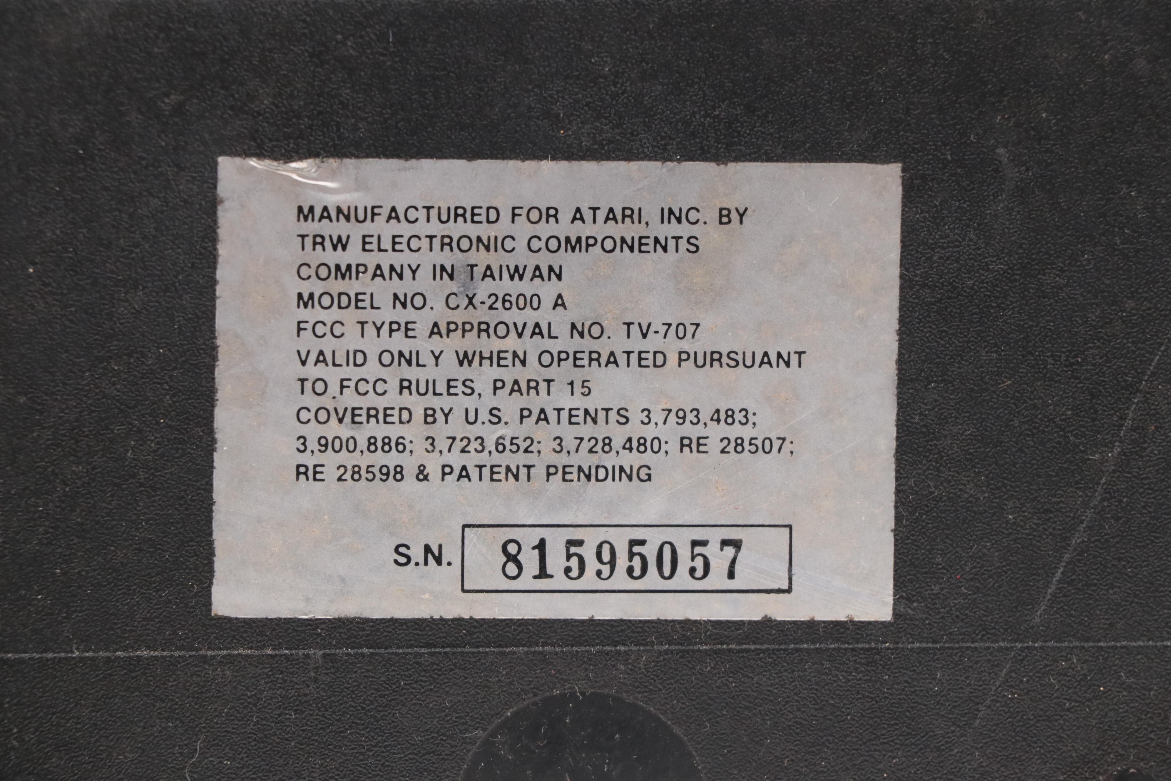 Atari 2600 Console with "Donkey Kong", "Frogger", "Pac-Man", and More