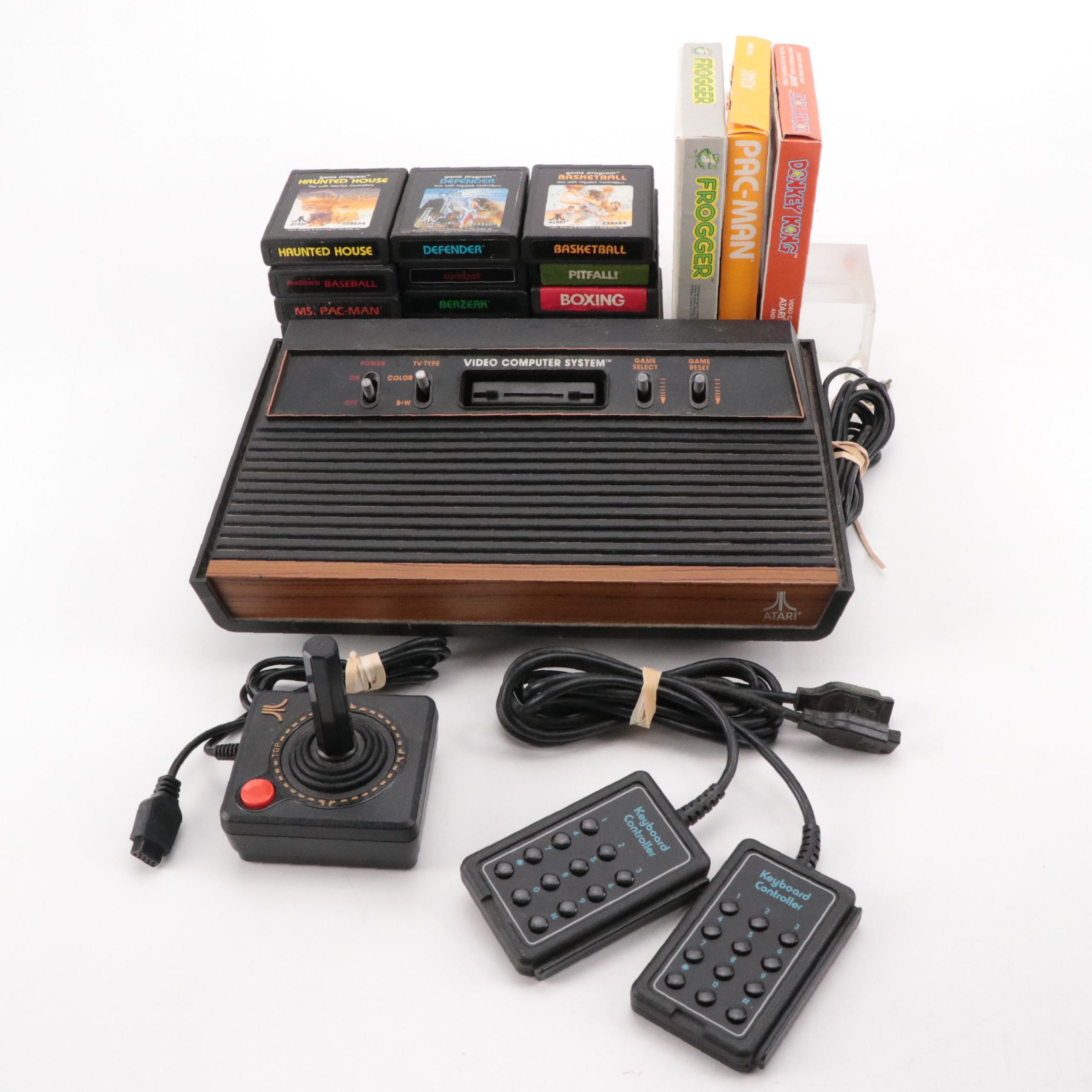 Atari 2600 Console with "Donkey Kong", "Frogger", "Pac-Man", and More