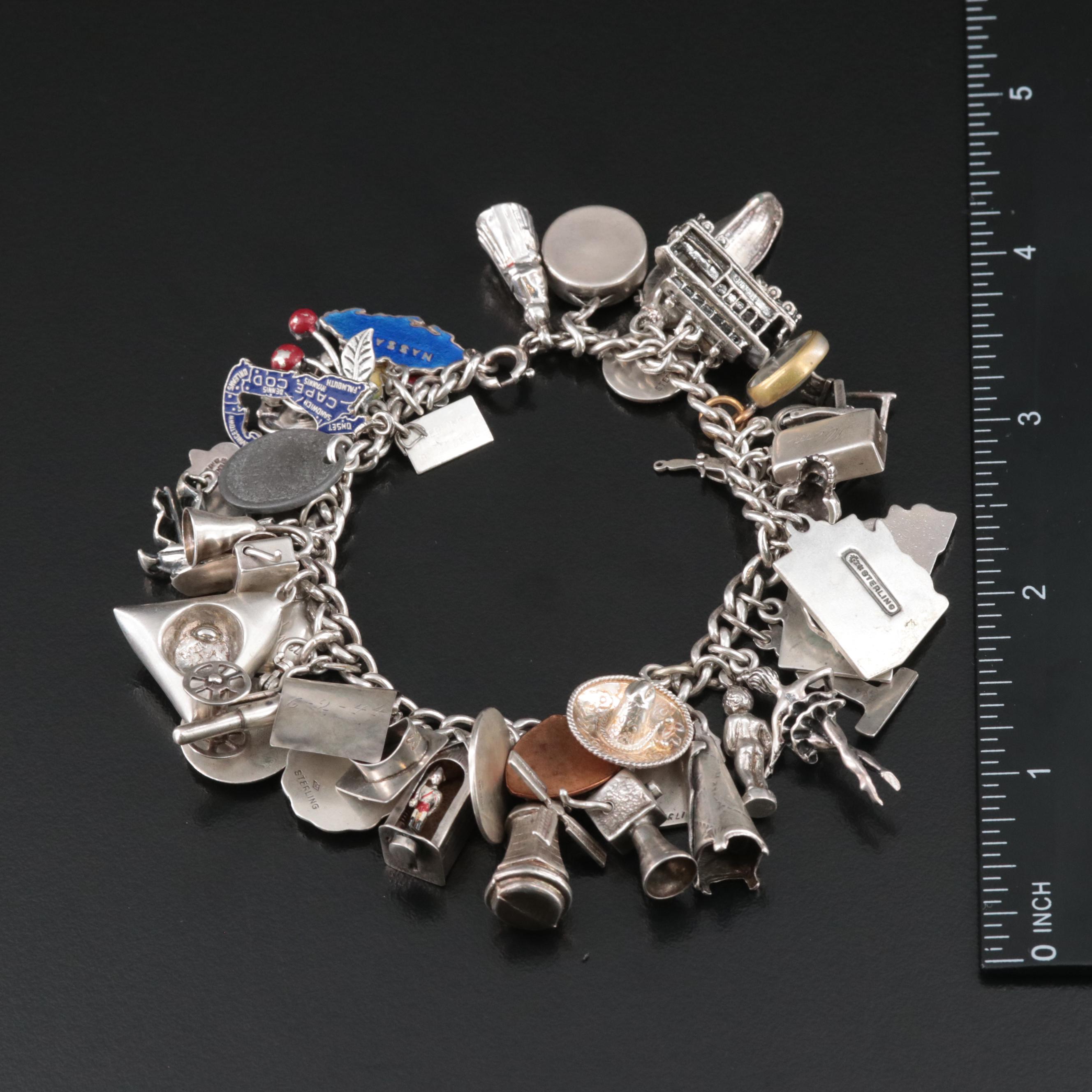 Sterling Charm Bracelet Including Articulated, Travel and Bell Trading Post
