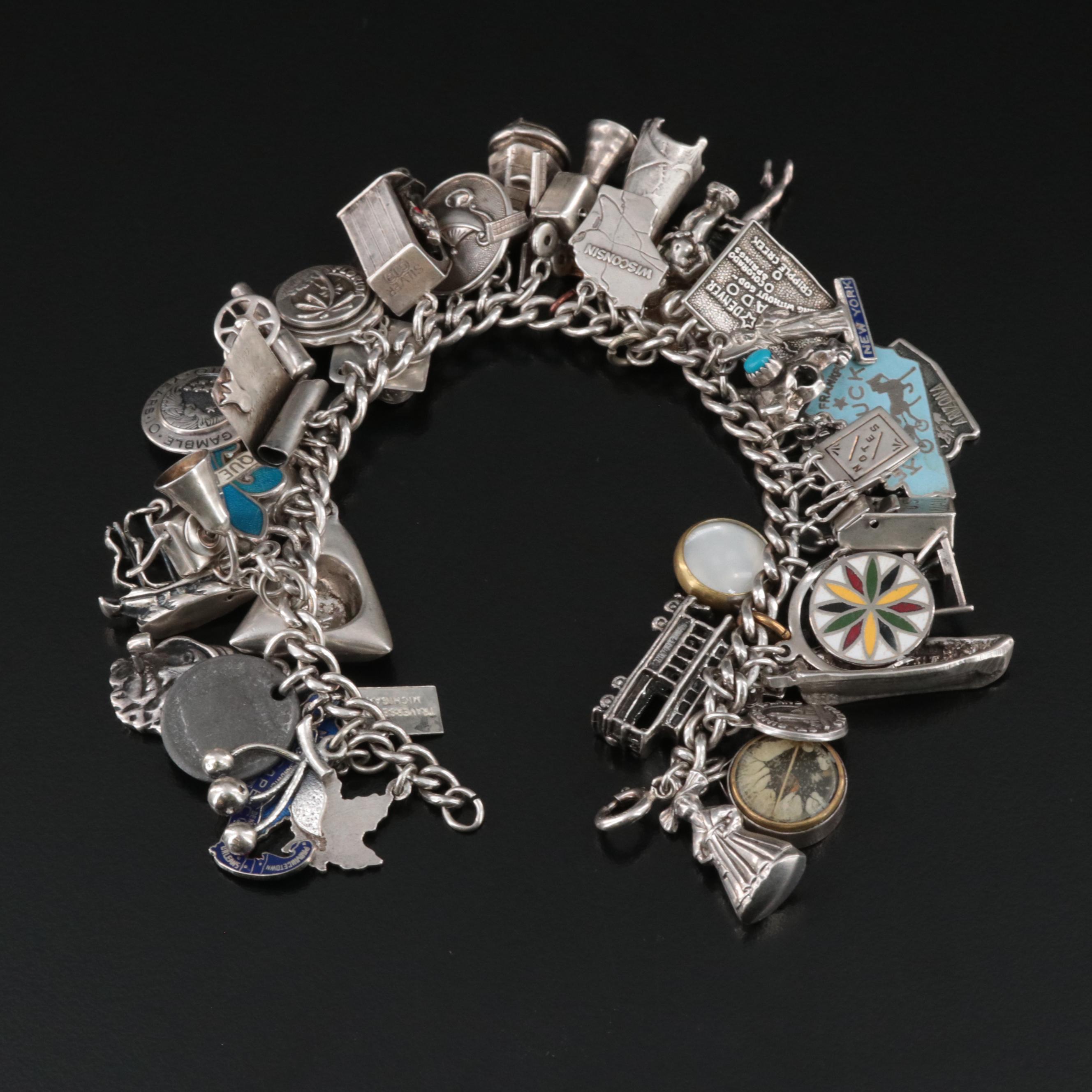 Sterling Charm Bracelet Including Articulated, Travel and Bell Trading Post