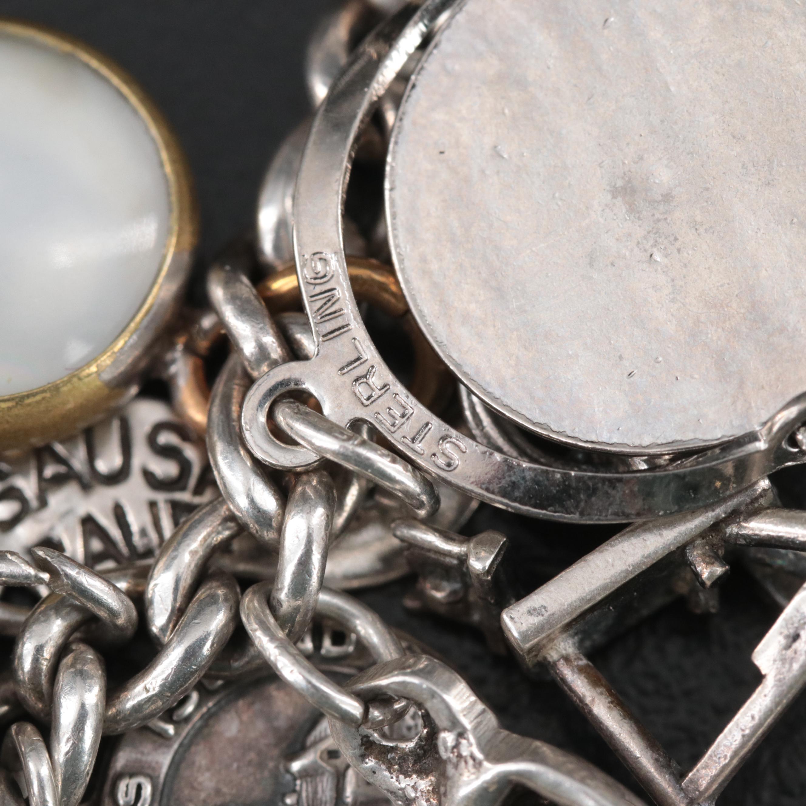 Sterling Charm Bracelet Including Articulated, Travel and Bell Trading Post