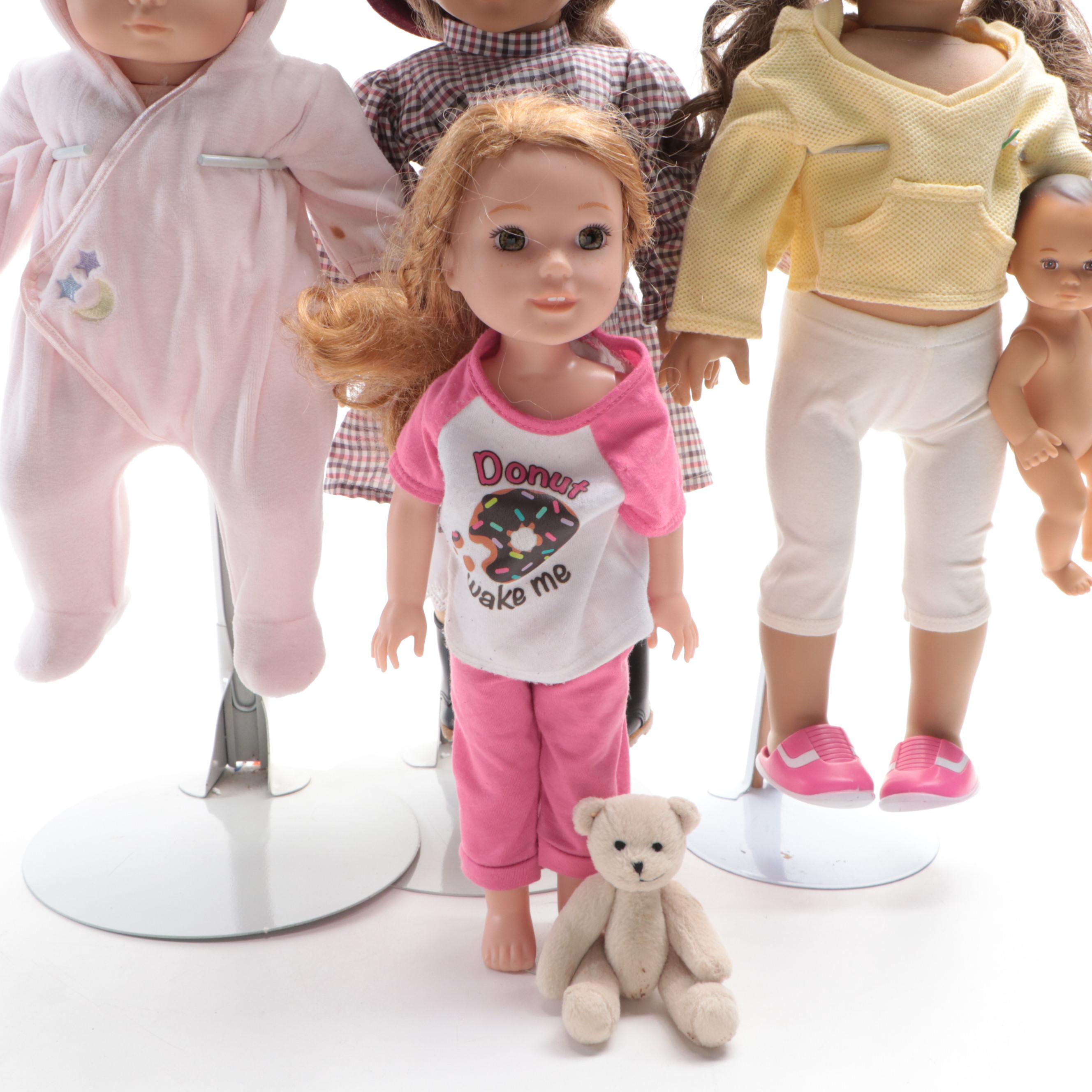 American Girl Dolls and Display Stands with Other Dolls