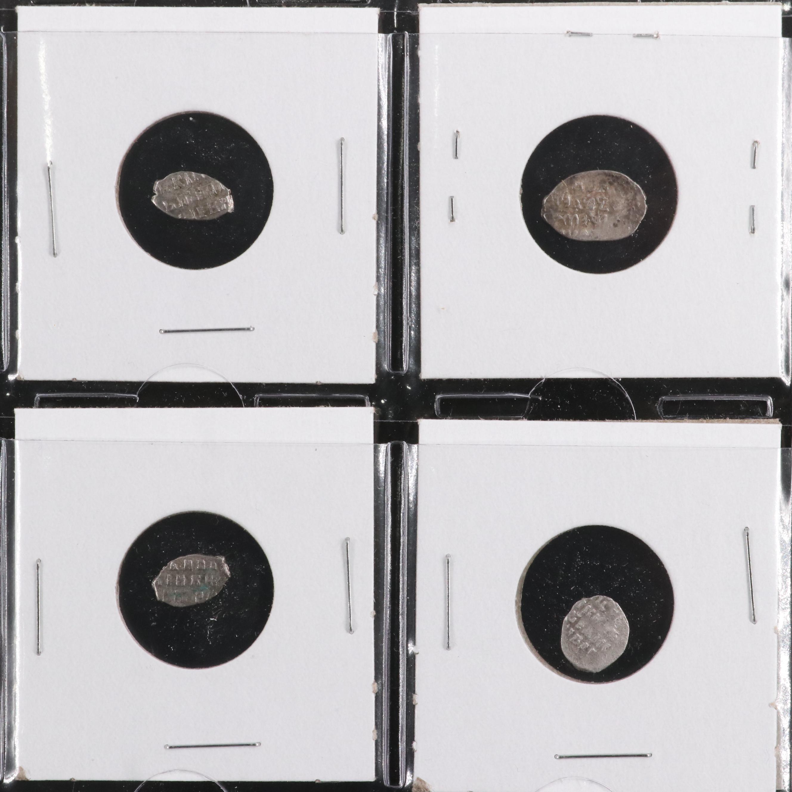 Eighteen Russian Silver "Wire Money" Coins, ca. 1500 to 1700