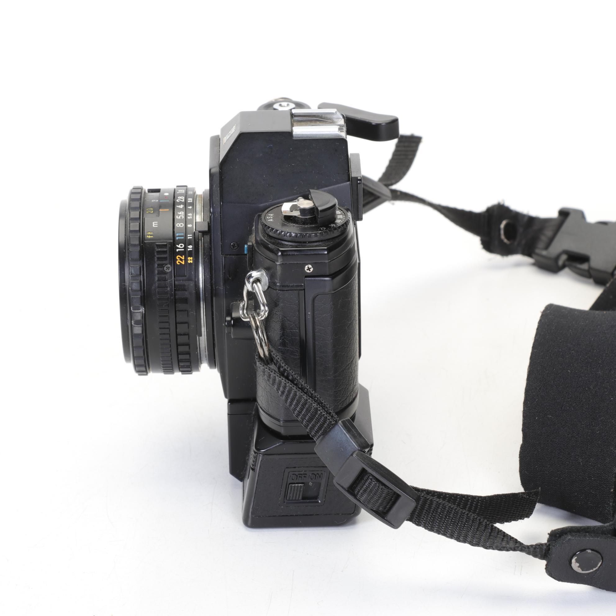 Nikon EM SLR with f/1.8 50mm and Other Camera Accessories