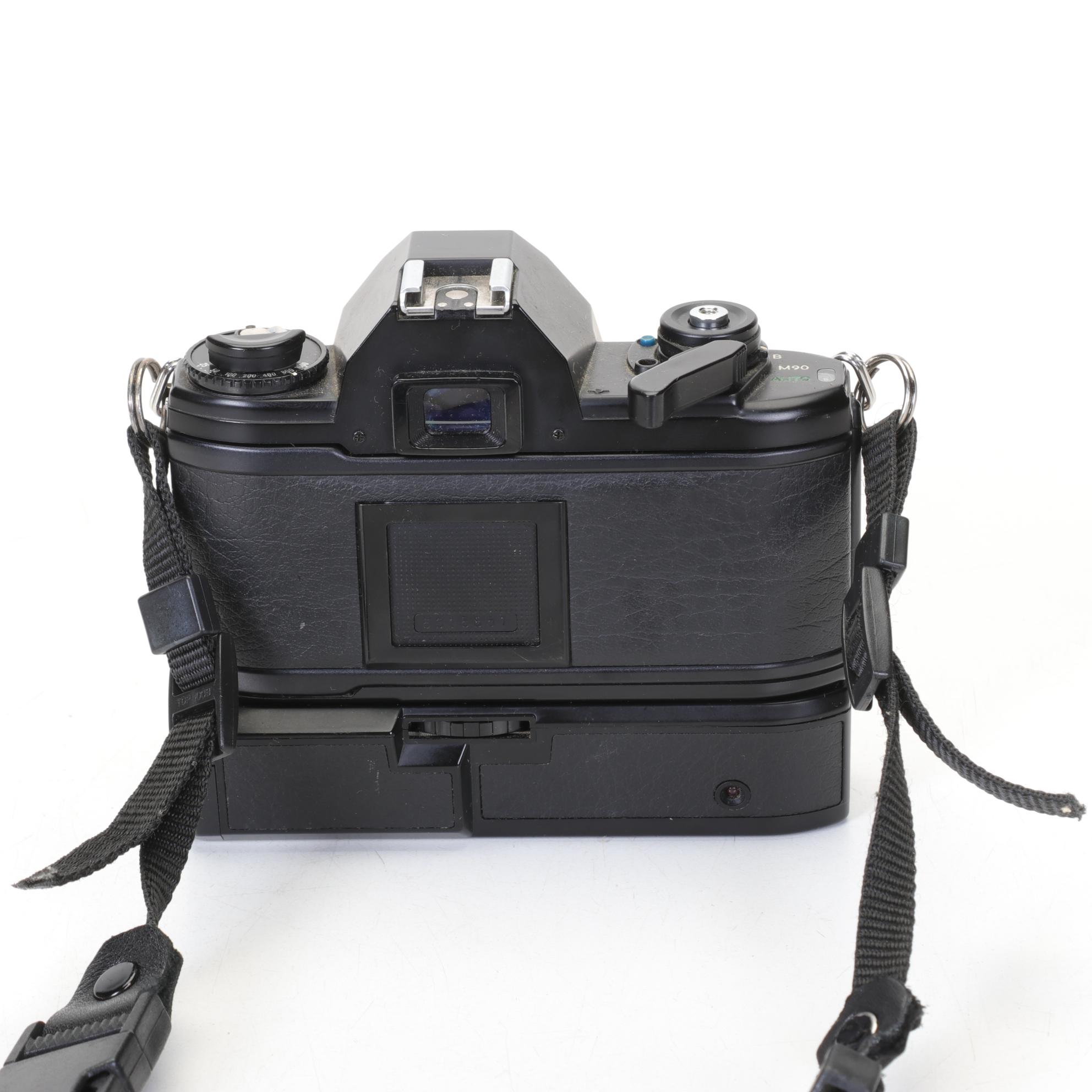 Nikon EM SLR with f/1.8 50mm and Other Camera Accessories