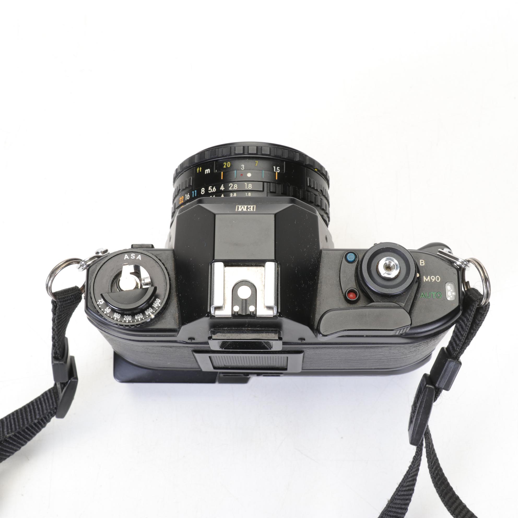 Nikon EM SLR with f/1.8 50mm and Other Camera Accessories