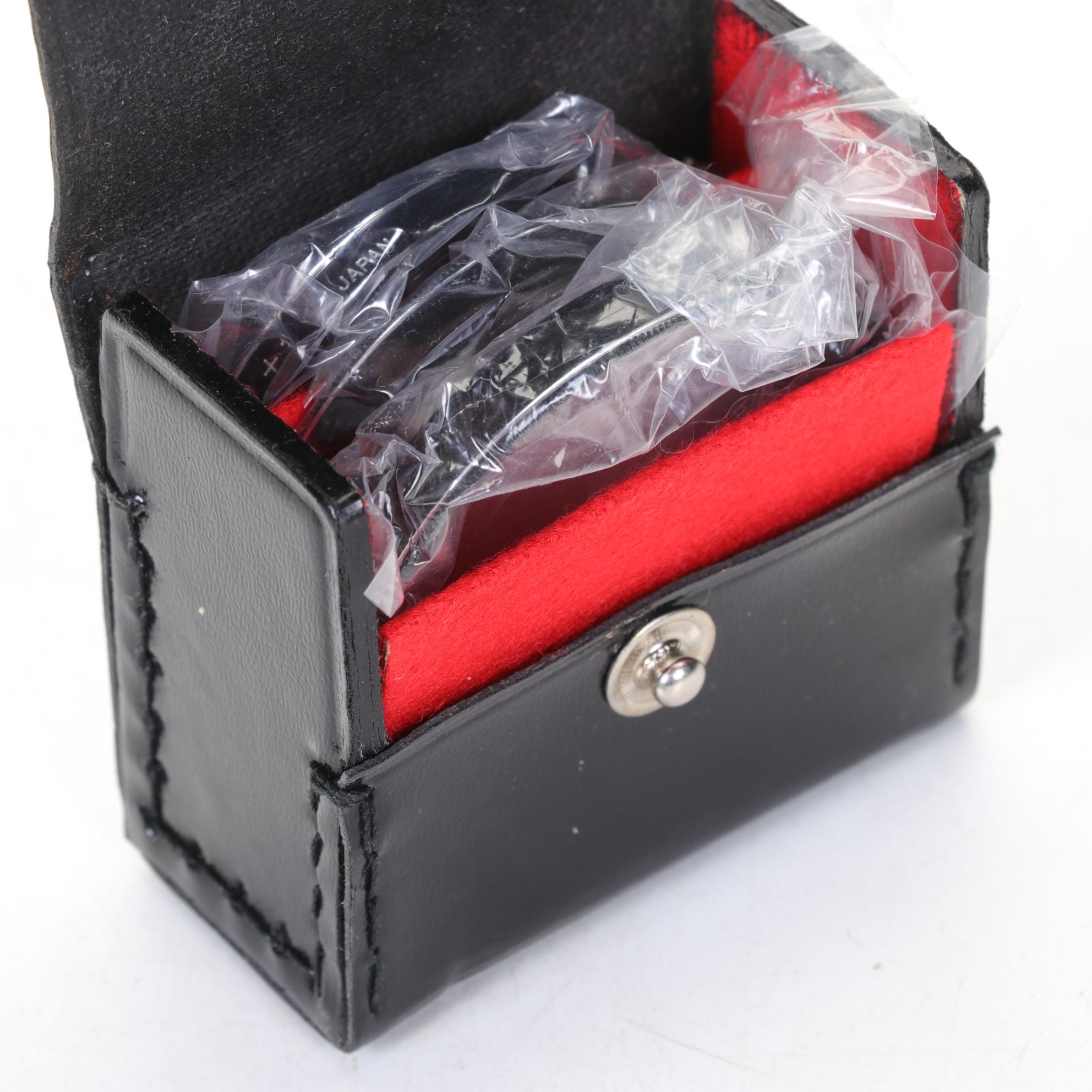 Nikon EM SLR with f/1.8 50mm and Other Camera Accessories