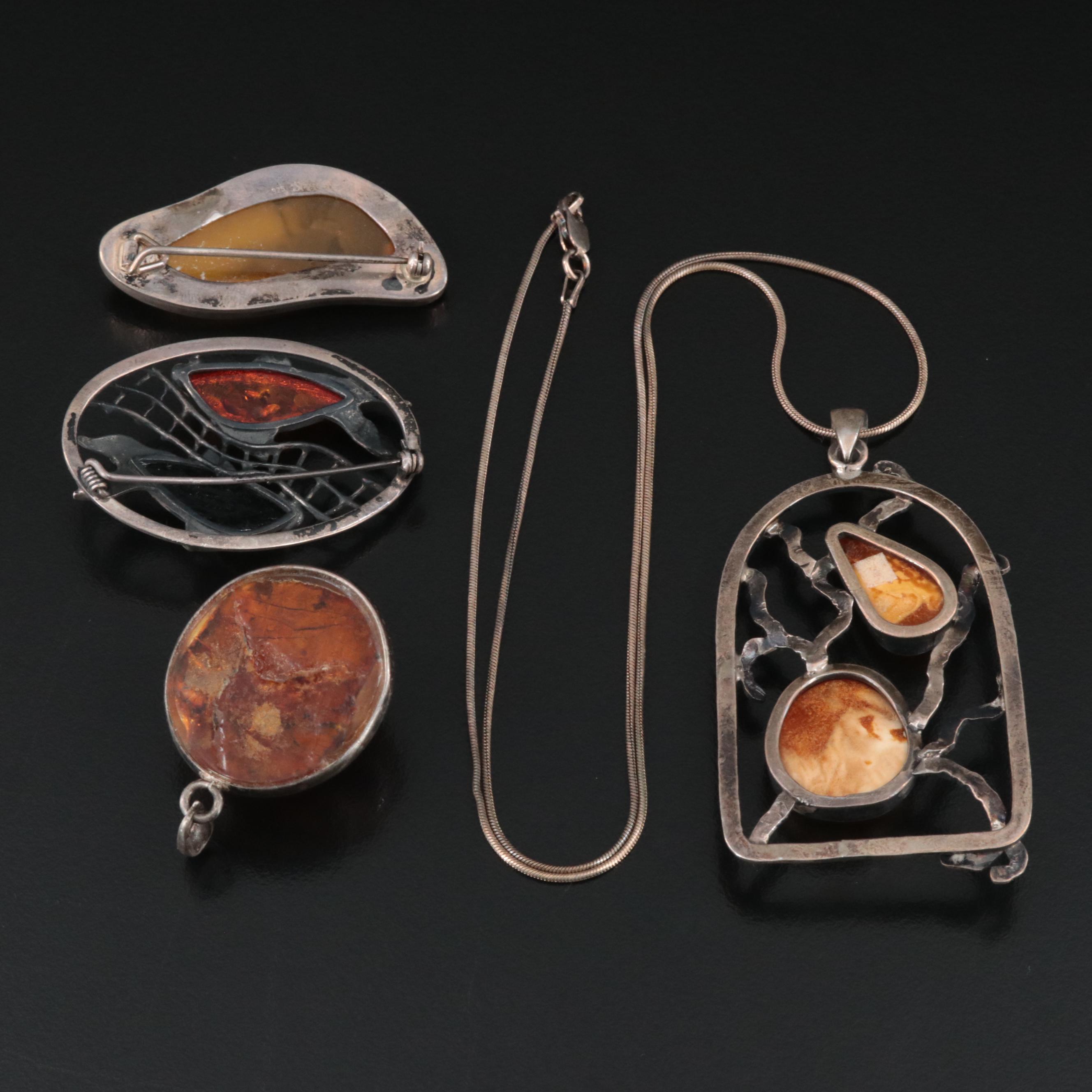 Sterling Pendant, Necklace and Brooches Including Copal and Amber