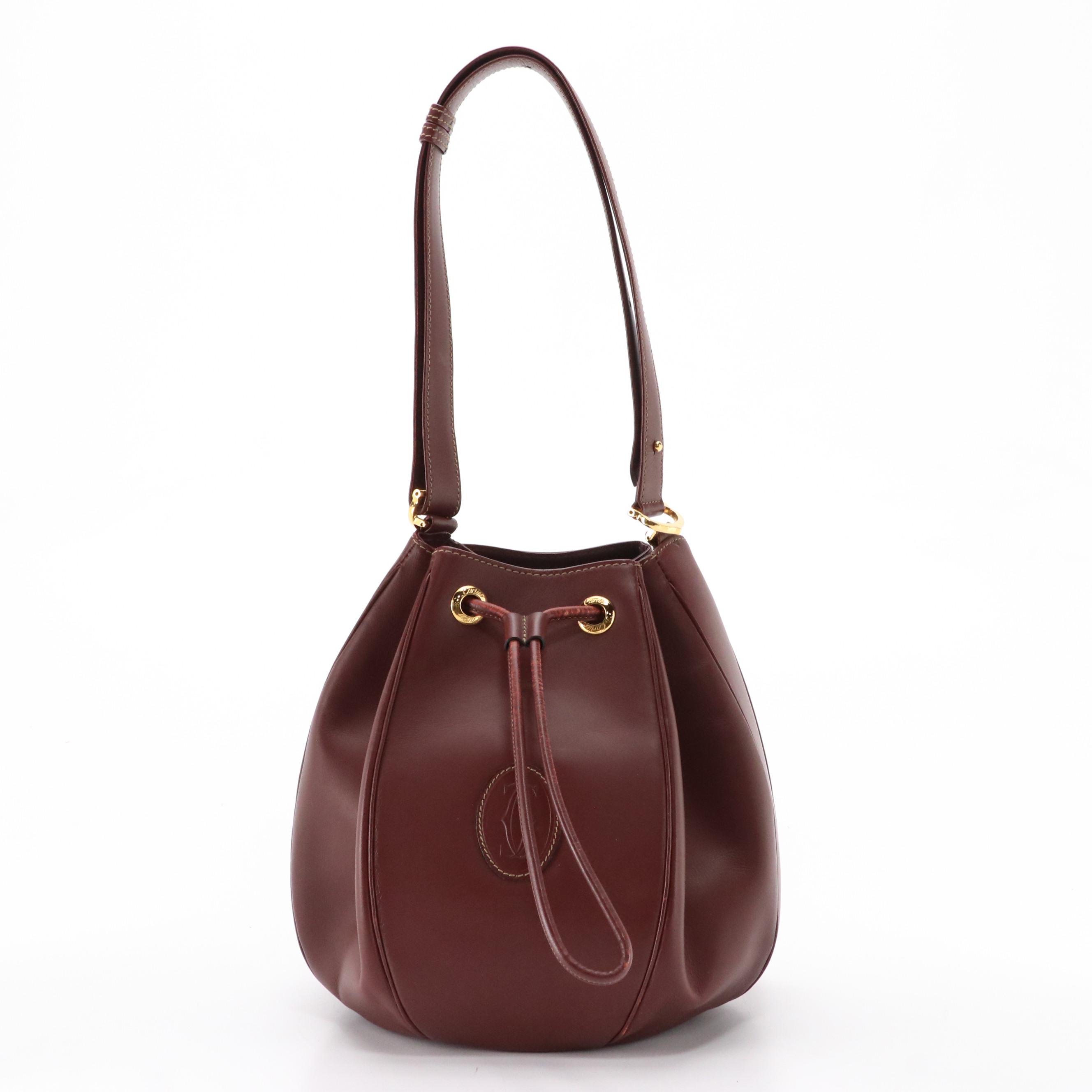 Cartier Must de Cartier Burgundy Leather Drawstring Bucket Bag