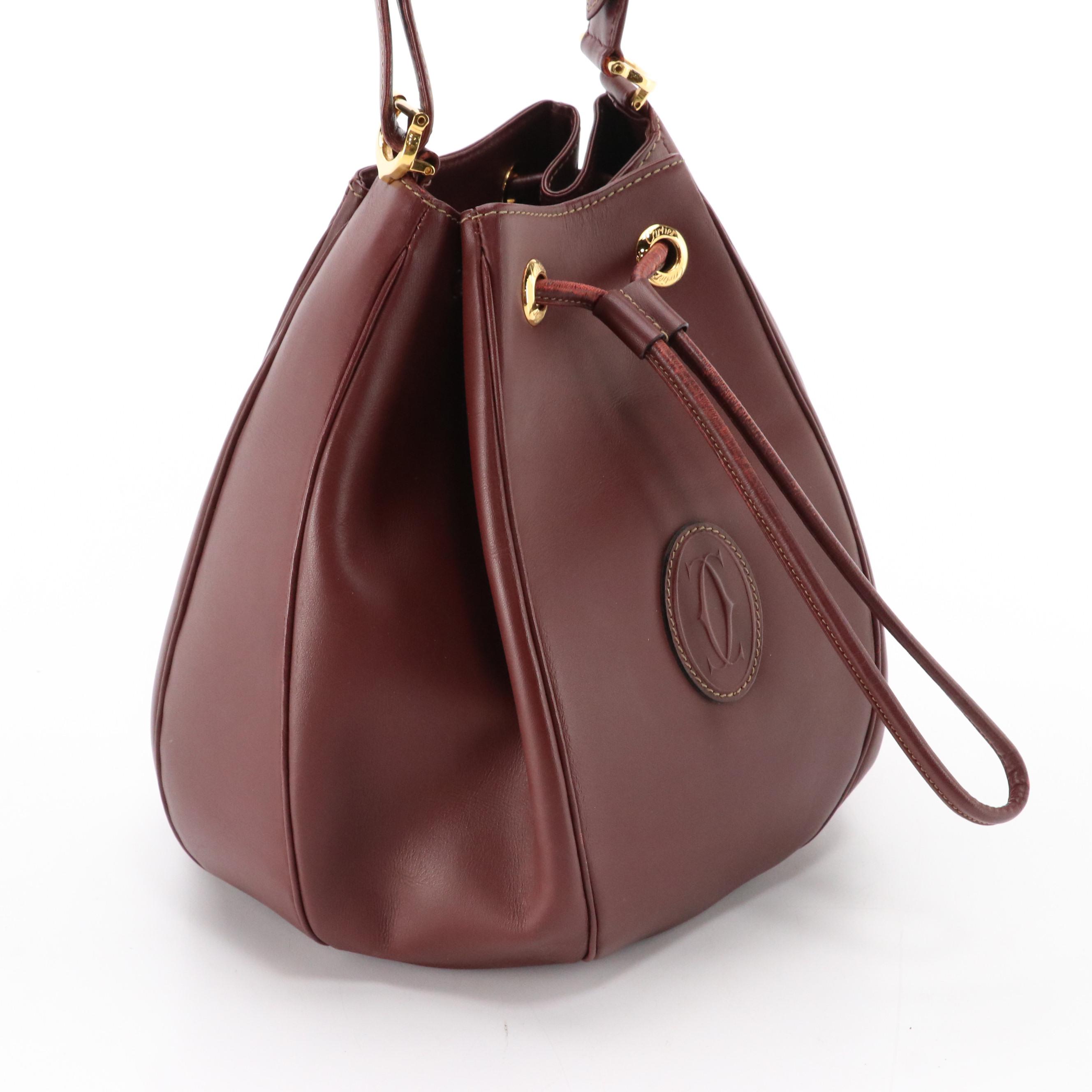 Cartier Must de Cartier Burgundy Leather Drawstring Bucket Bag