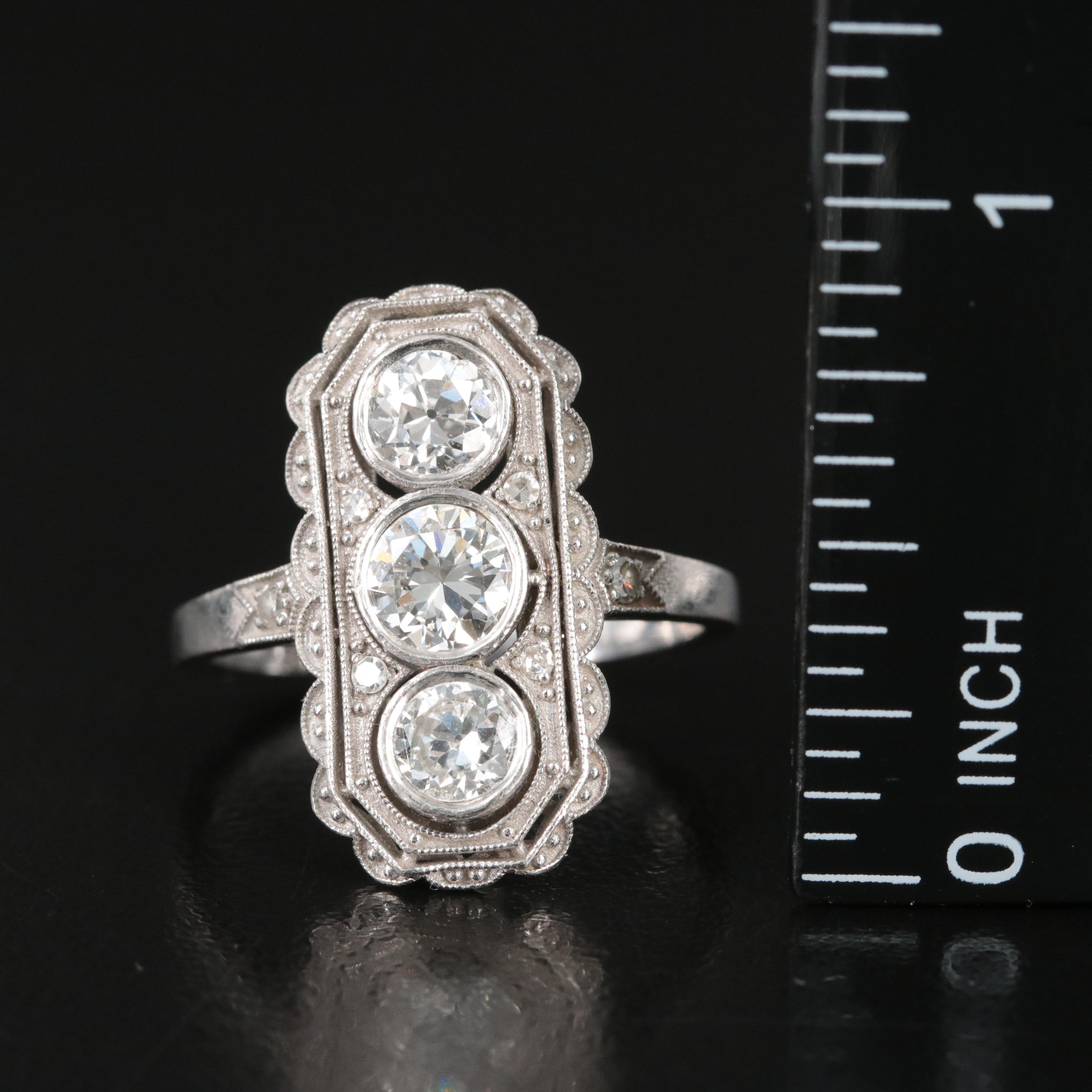 1930s Platinum 1.61 CTW Diamond Three Stone Vertical Ring