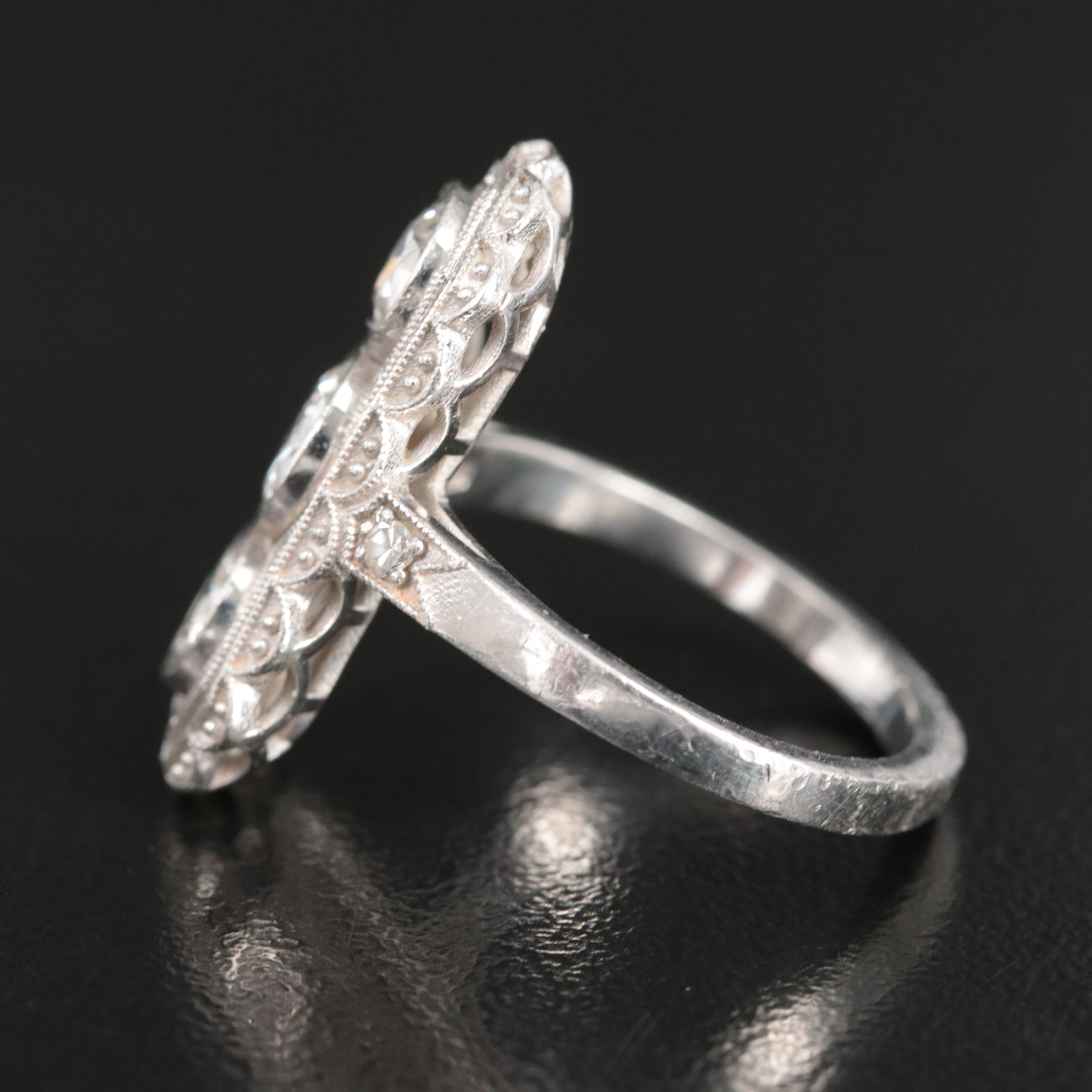 1930s Platinum 1.61 CTW Diamond Three Stone Vertical Ring