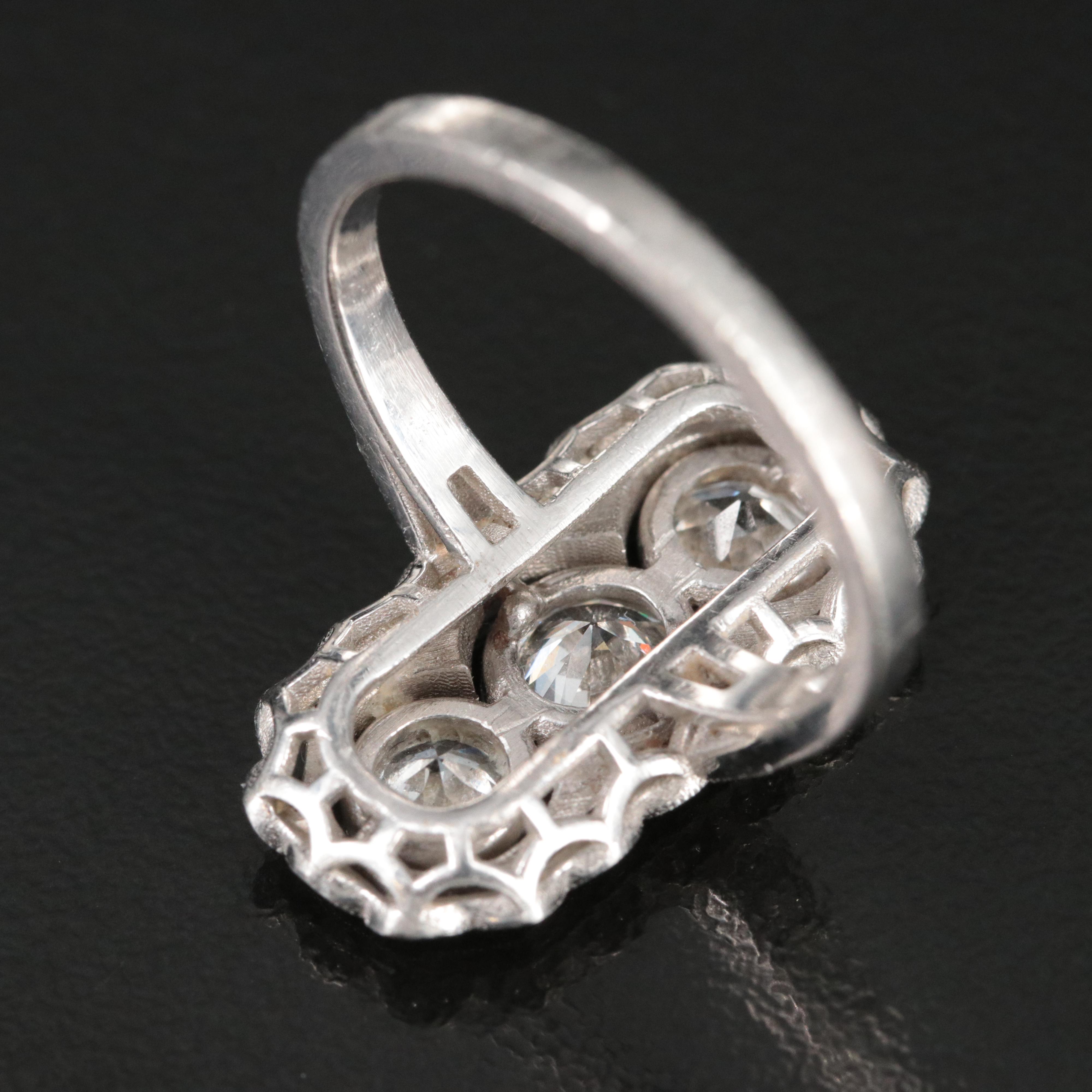 1930s Platinum 1.61 CTW Diamond Three Stone Vertical Ring