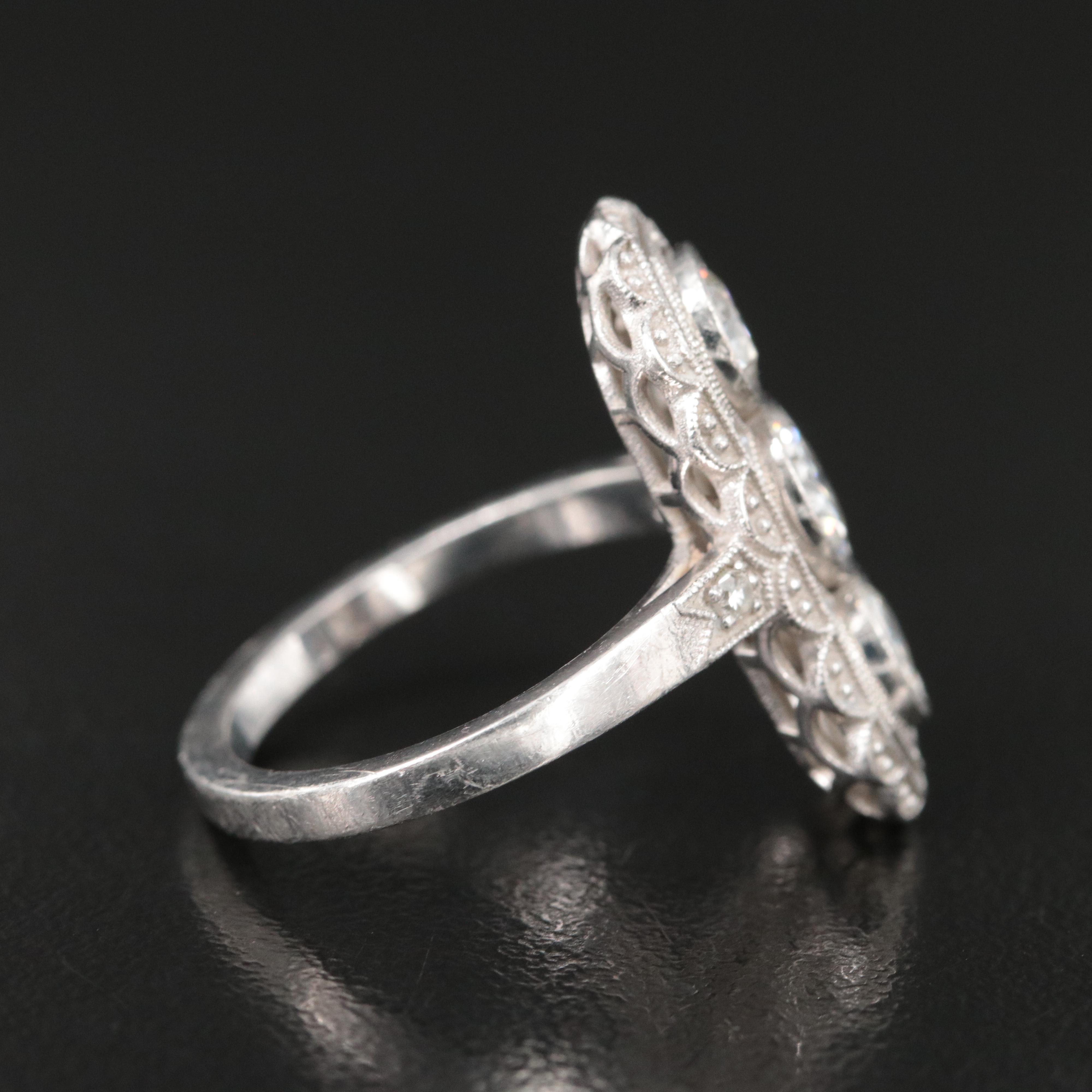 1930s Platinum 1.61 CTW Diamond Three Stone Vertical Ring