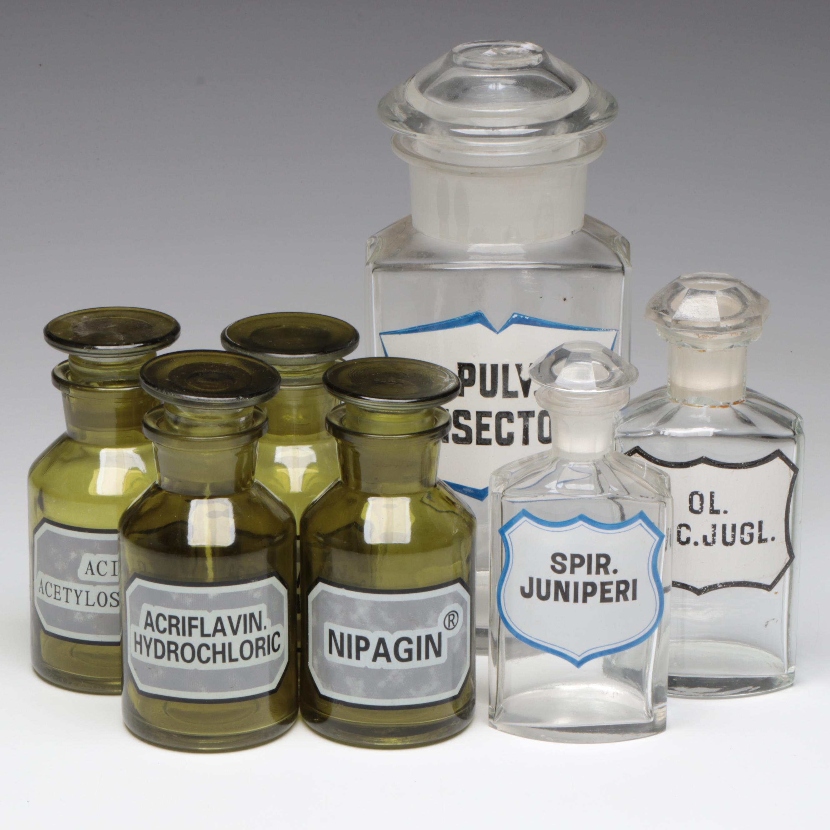 Green and Clear Glass Apothecary Bottles