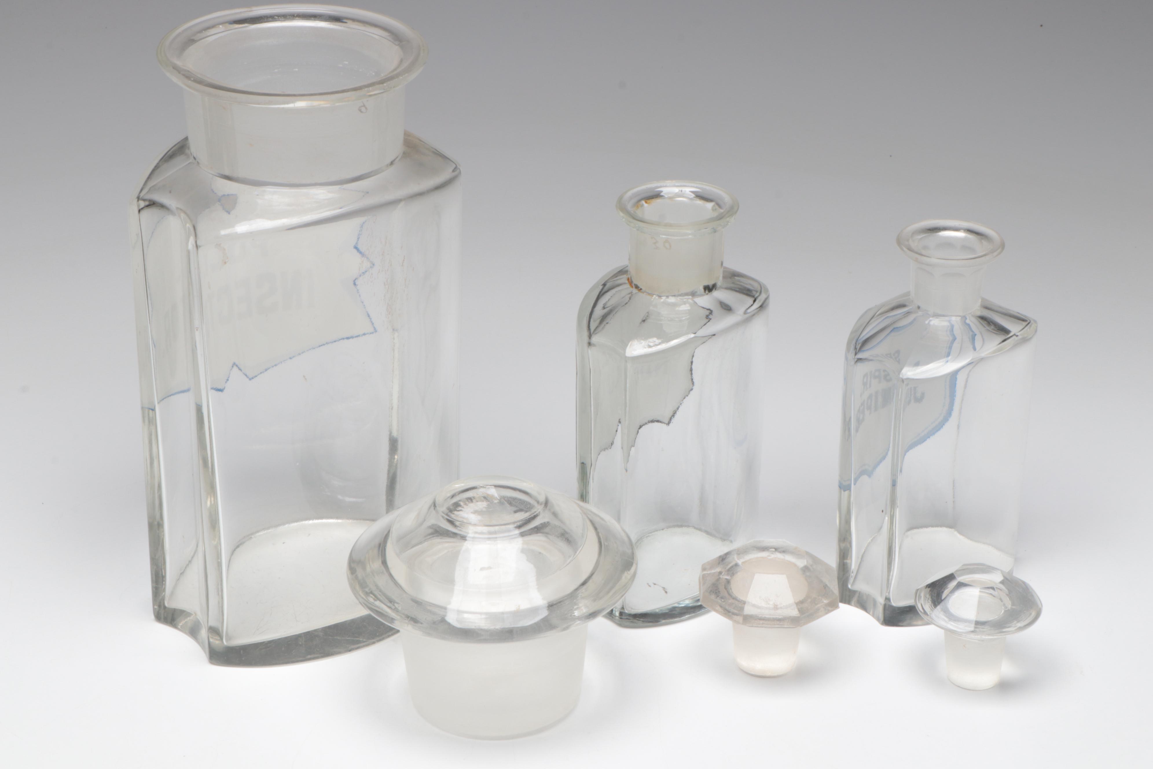 Green and Clear Glass Apothecary Bottles