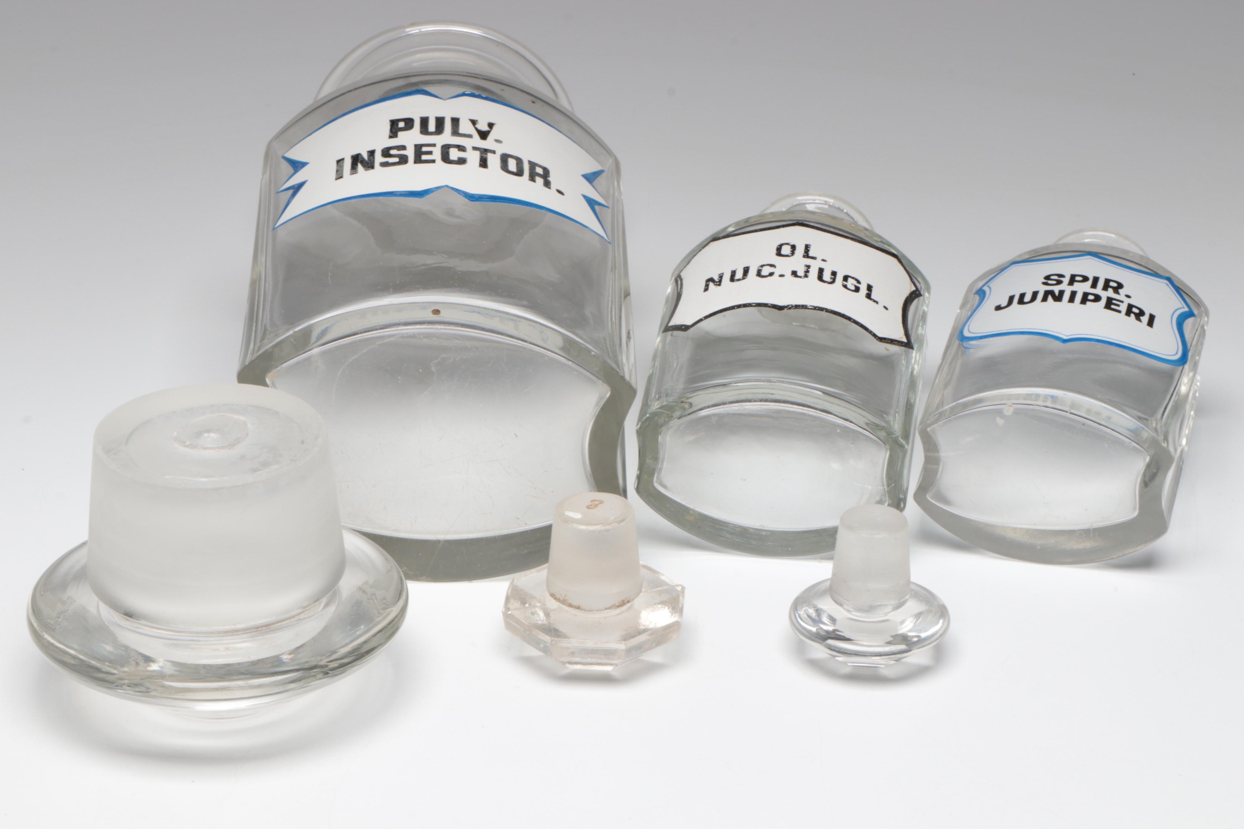 Green and Clear Glass Apothecary Bottles