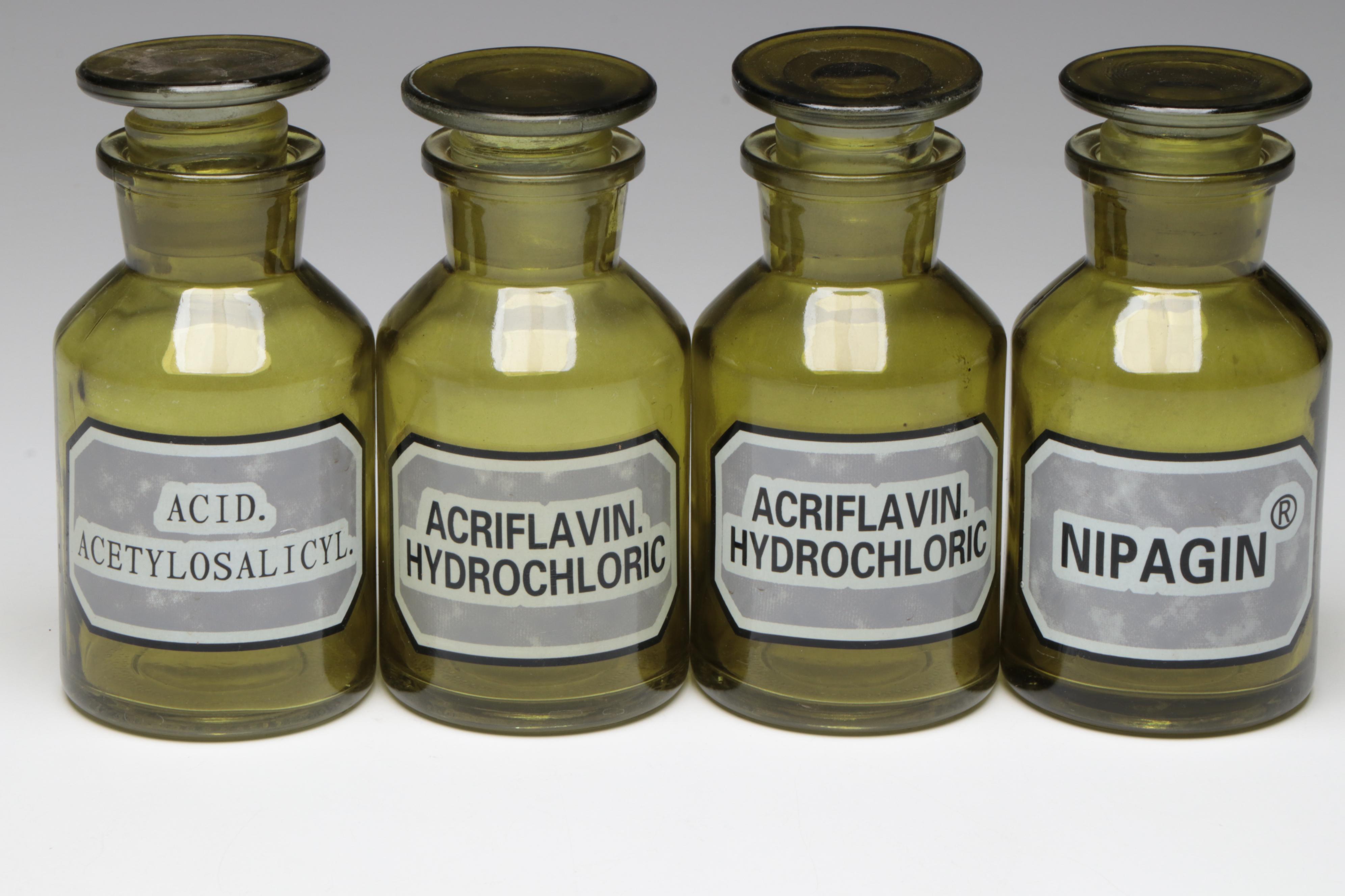 Green and Clear Glass Apothecary Bottles