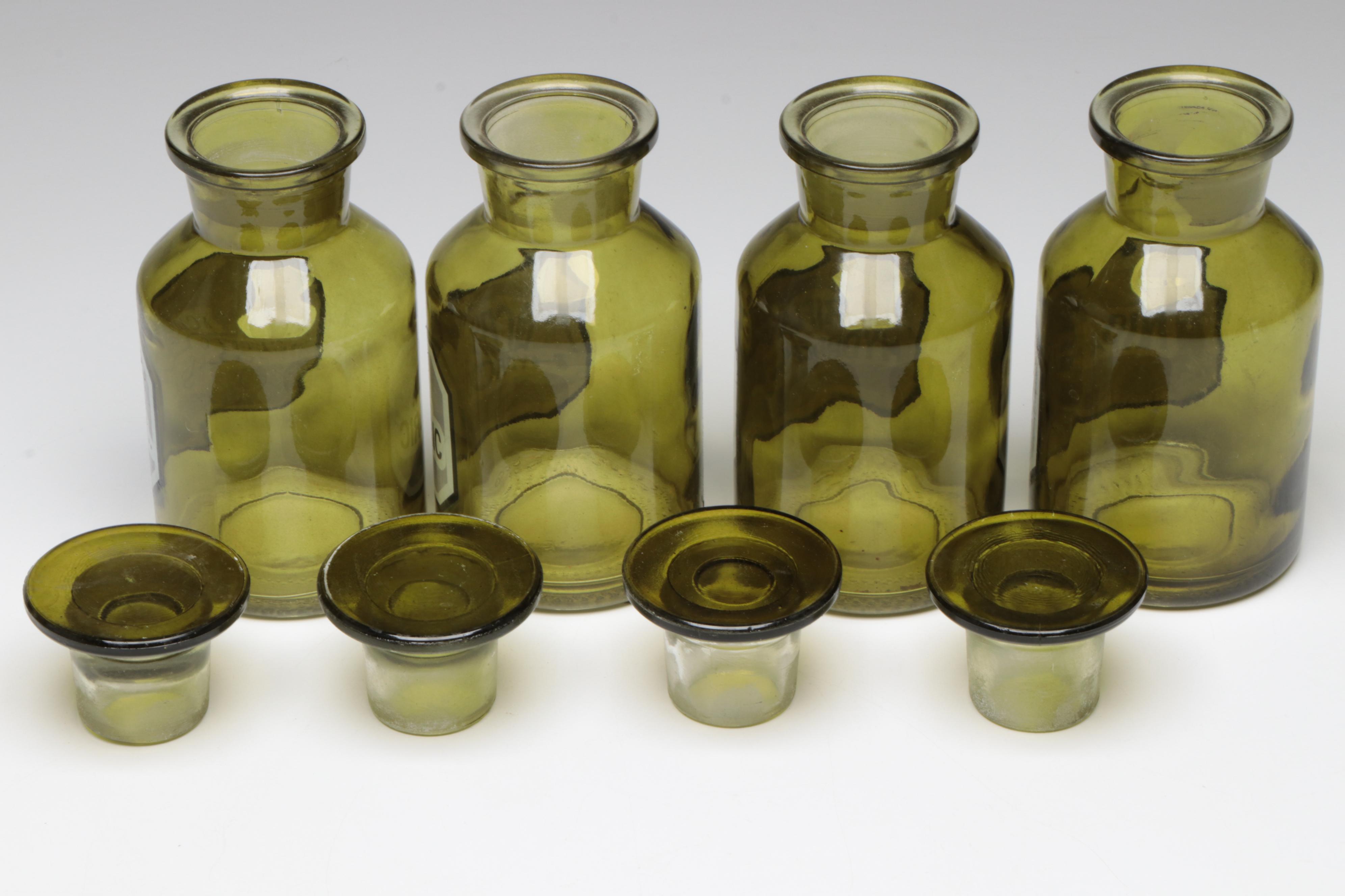Green and Clear Glass Apothecary Bottles