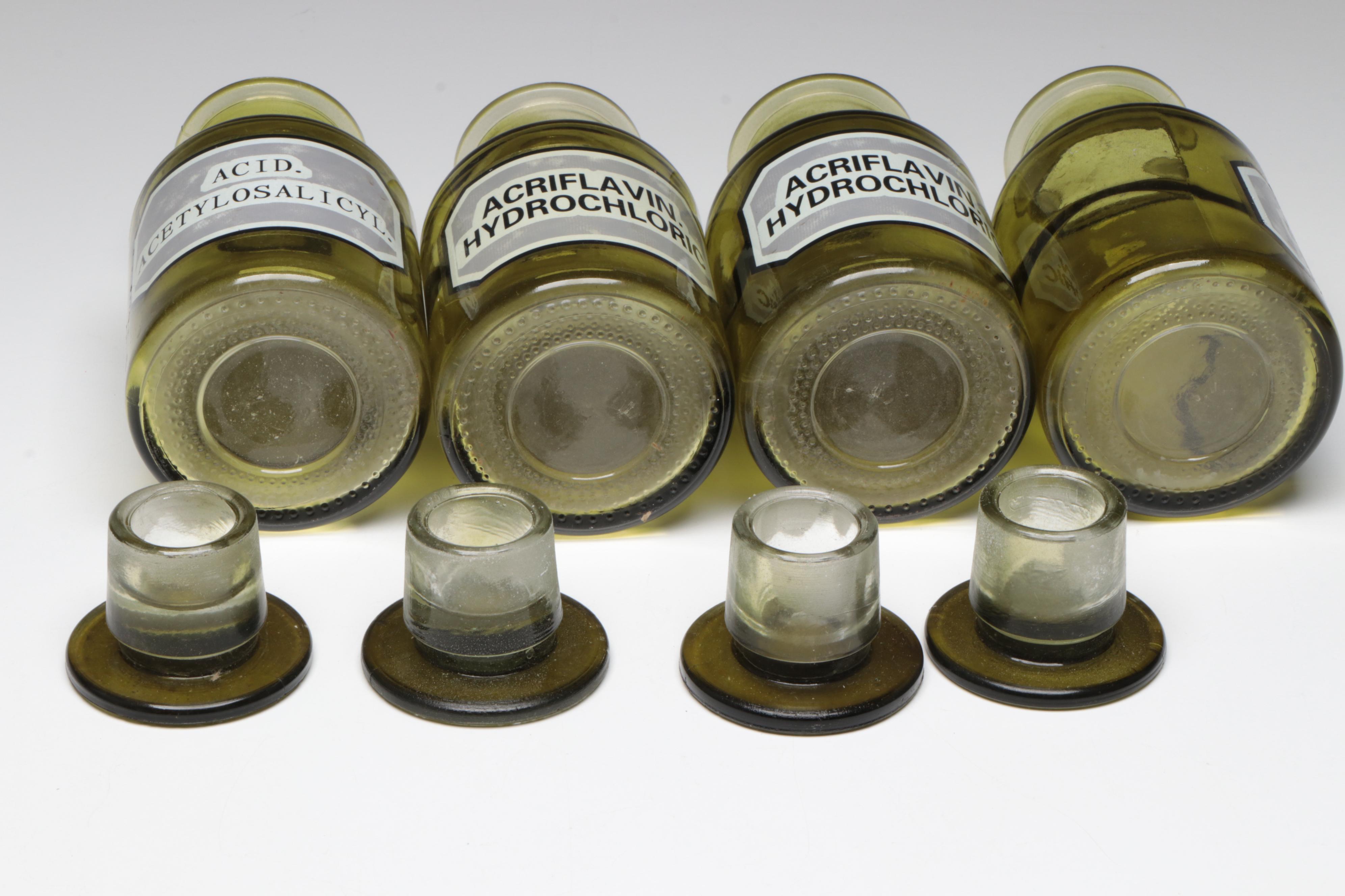 Green and Clear Glass Apothecary Bottles