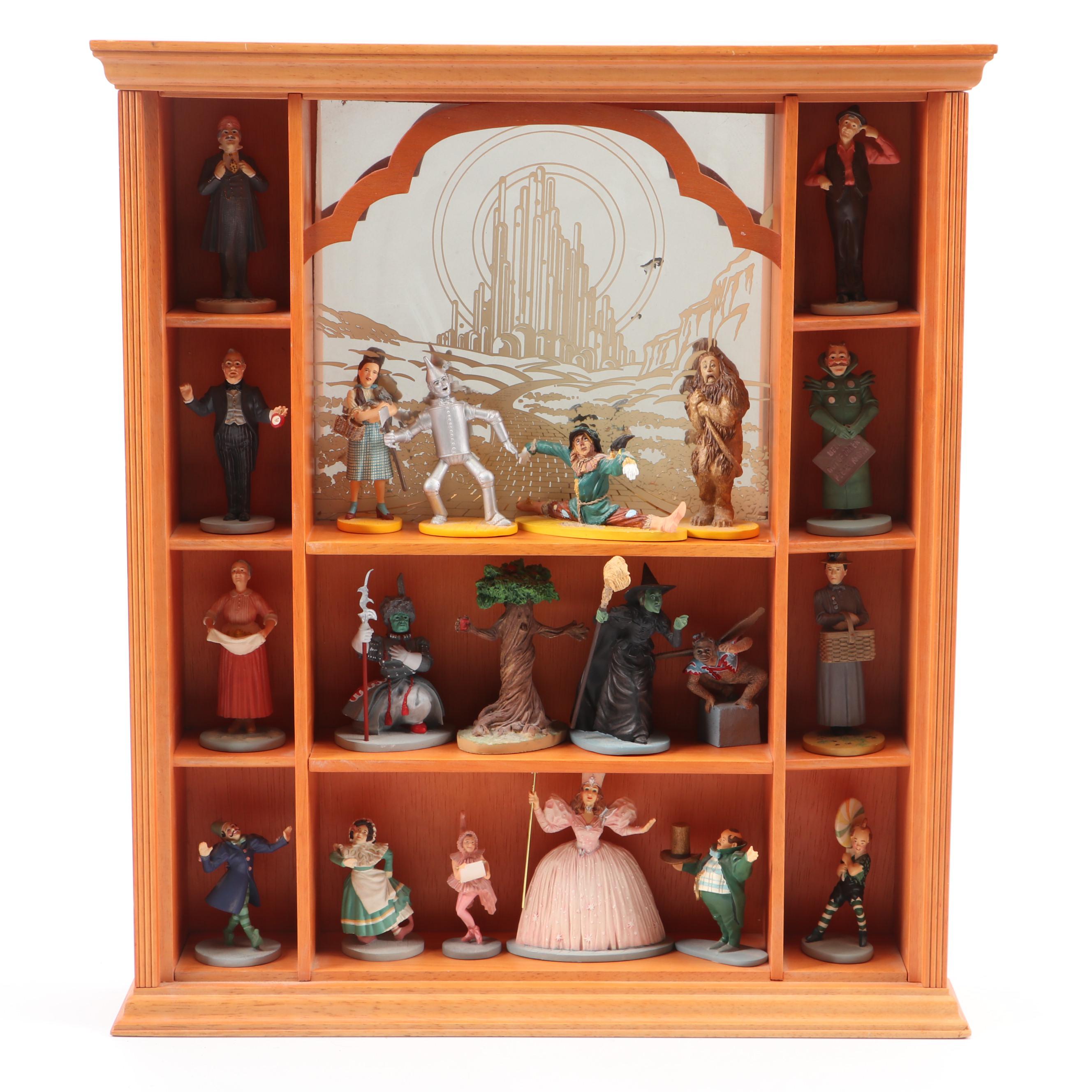 "Wizard of Oz" Figurines and Display Cabinet including "Tin Man" and "Auntie Em"
