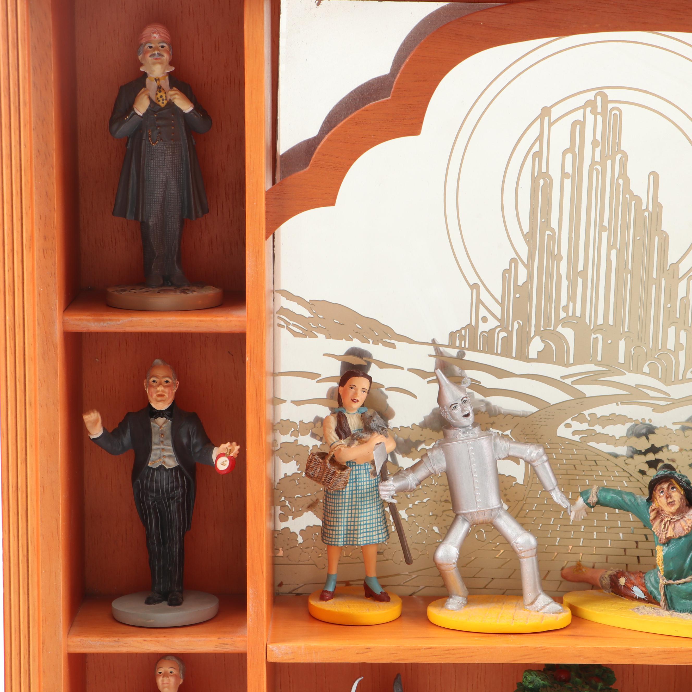 "Wizard of Oz" Figurines and Display Cabinet including "Tin Man" and "Auntie Em"
