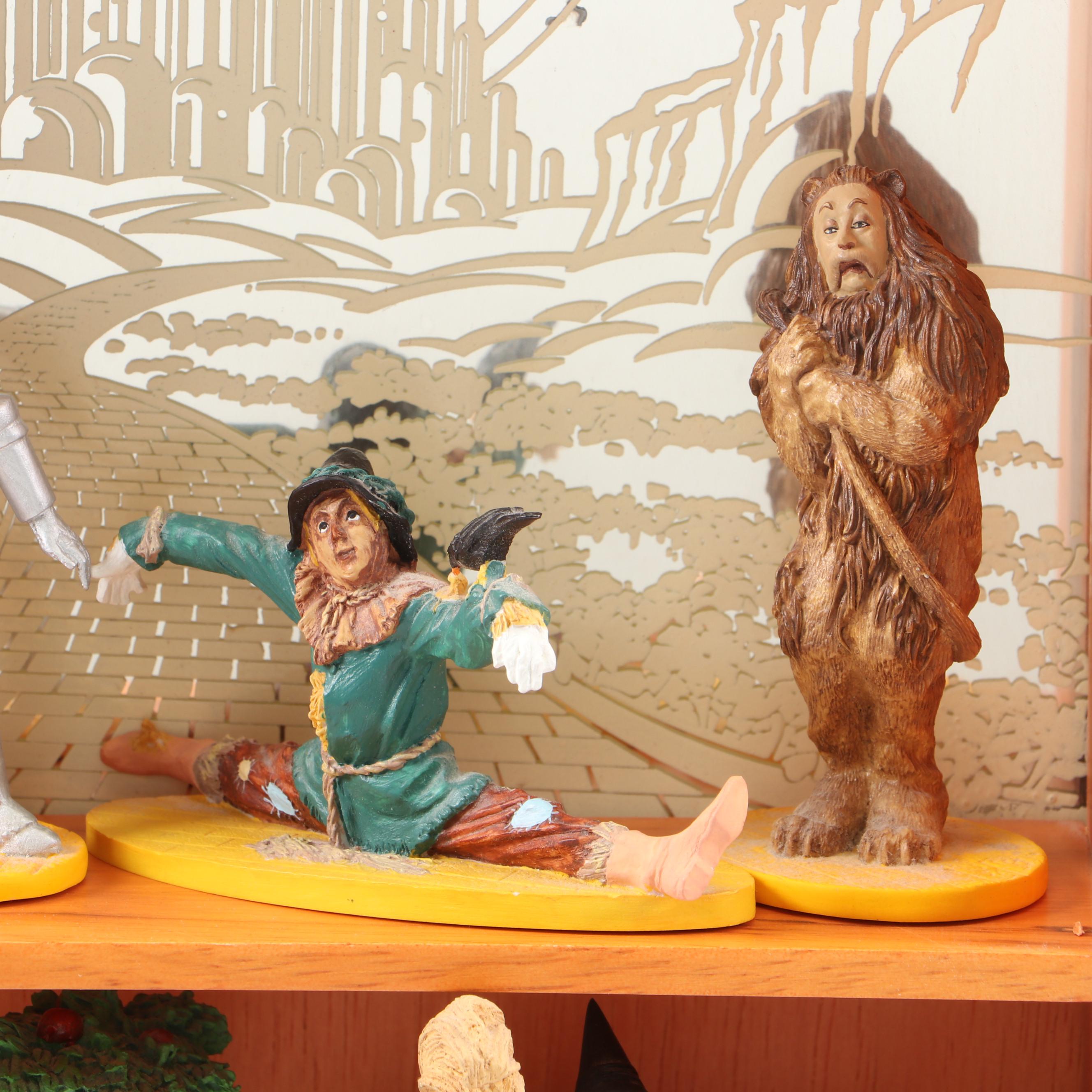 "Wizard of Oz" Figurines and Display Cabinet including "Tin Man" and "Auntie Em"