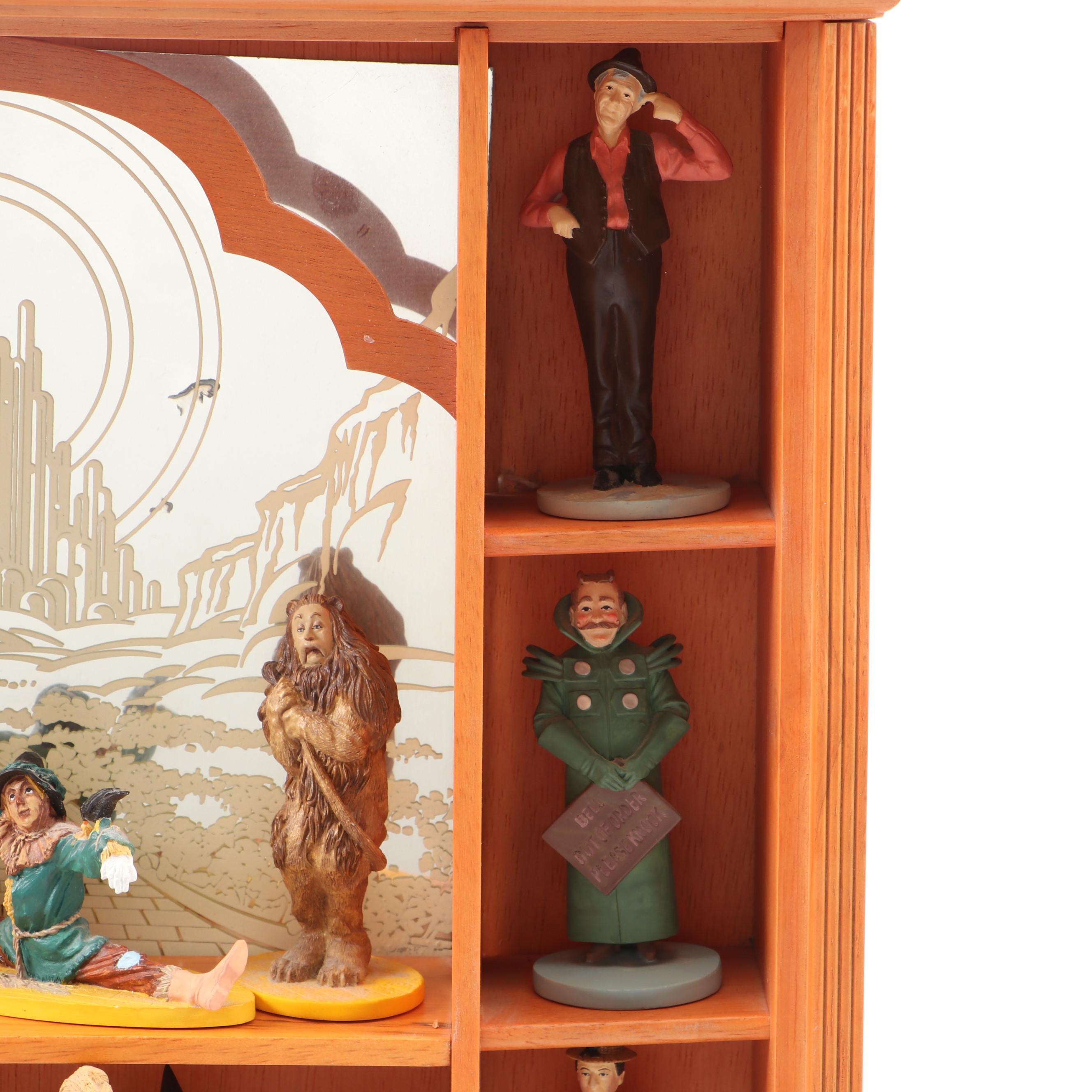 "Wizard of Oz" Figurines and Display Cabinet including "Tin Man" and "Auntie Em"