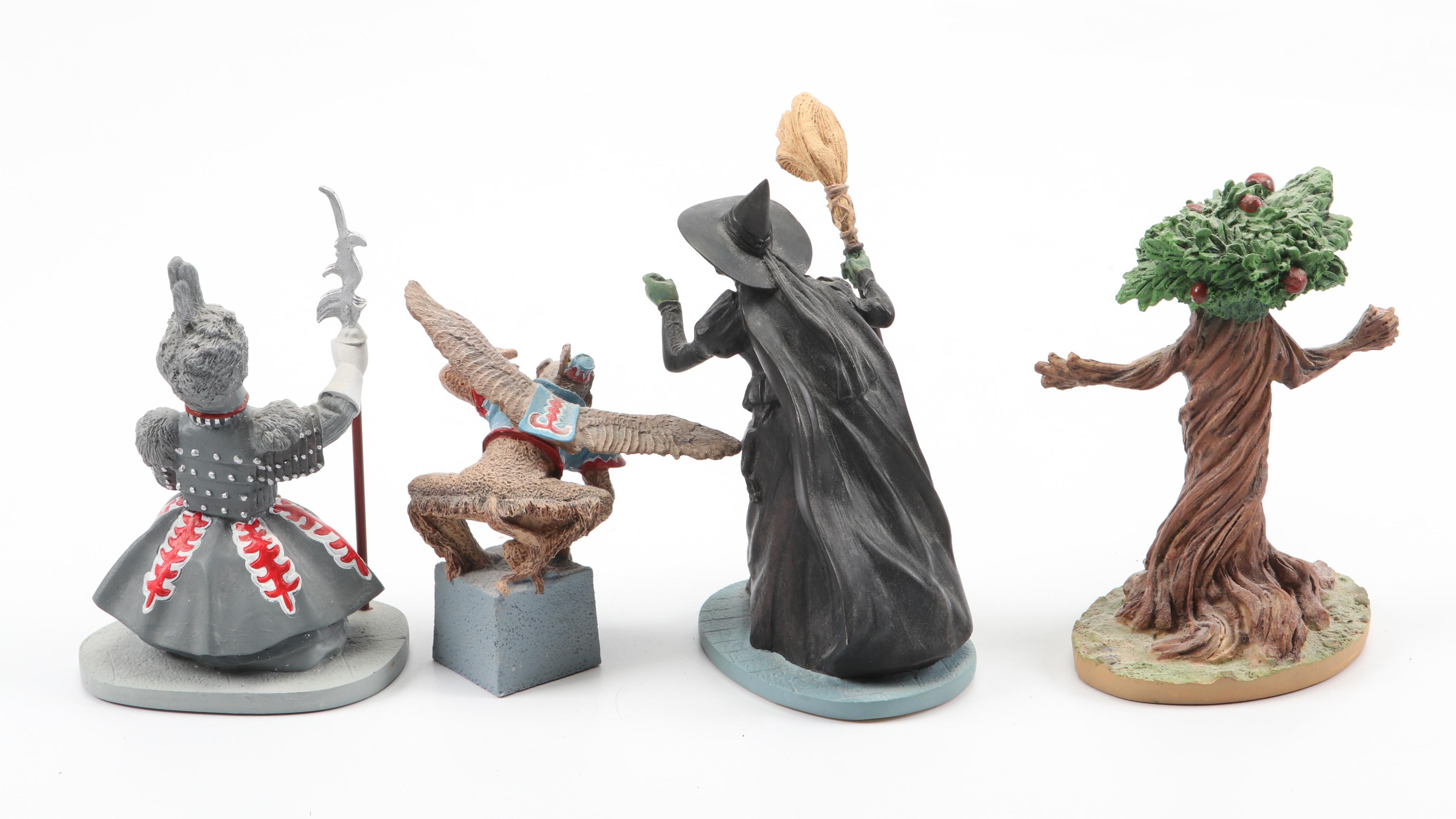 "Wizard of Oz" Figurines and Display Cabinet including "Tin Man" and "Auntie Em"