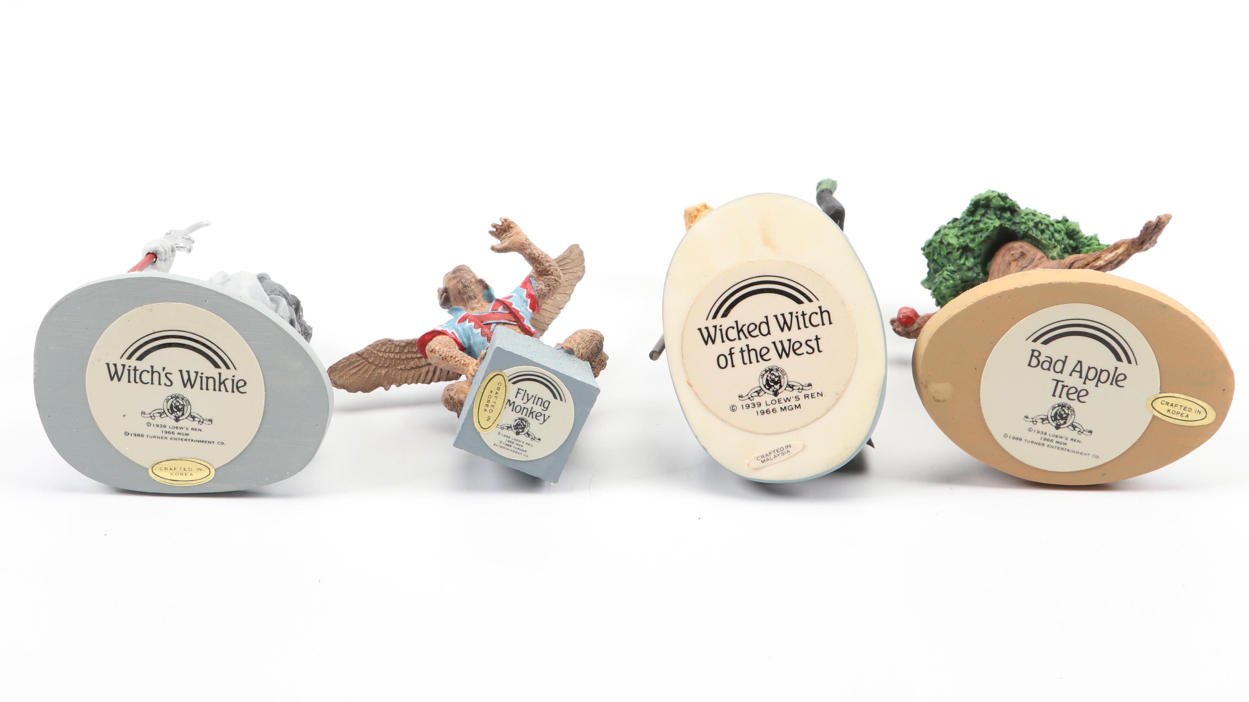 "Wizard of Oz" Figurines and Display Cabinet including "Tin Man" and "Auntie Em"