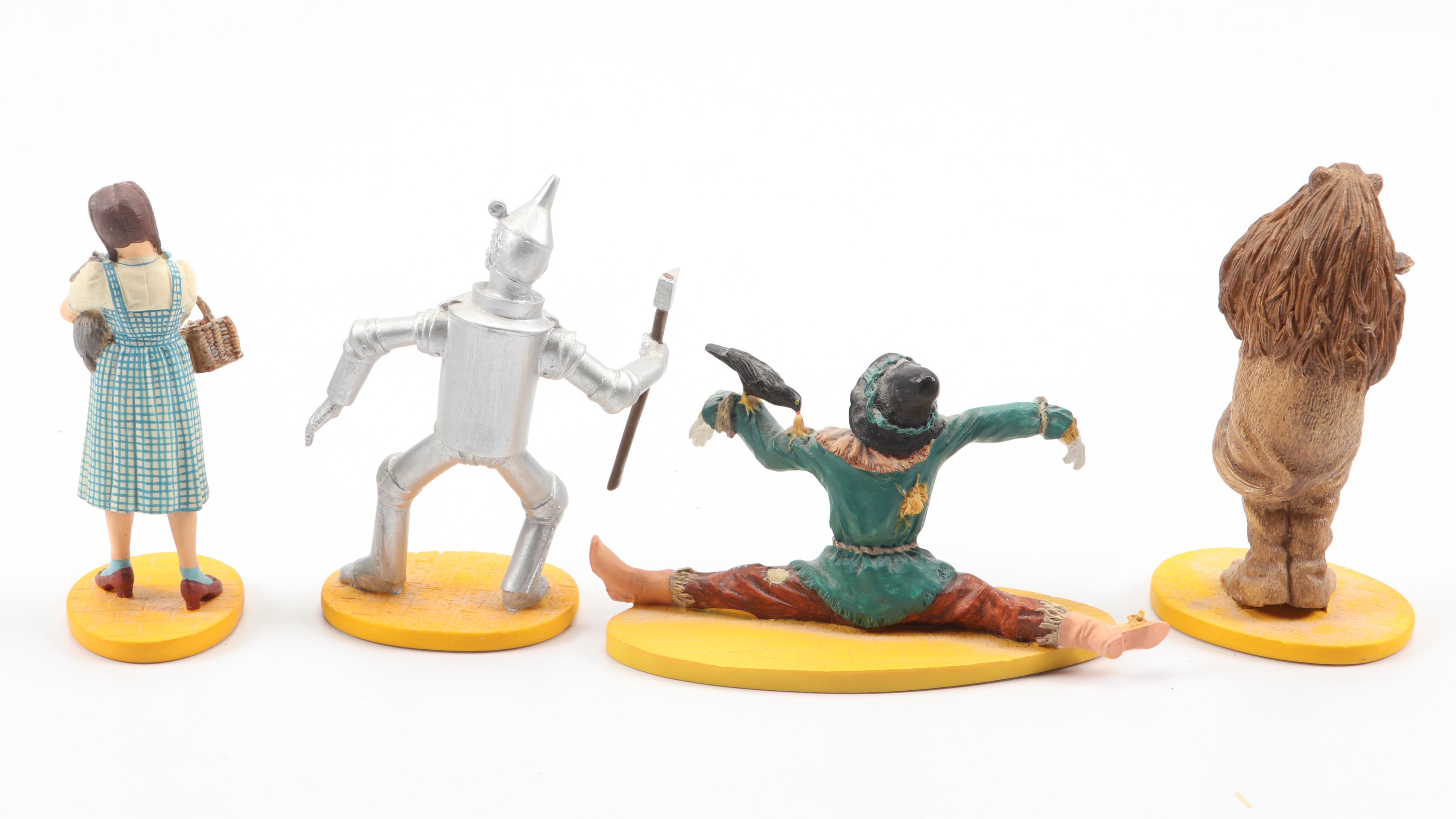 "Wizard of Oz" Figurines and Display Cabinet including "Tin Man" and "Auntie Em"