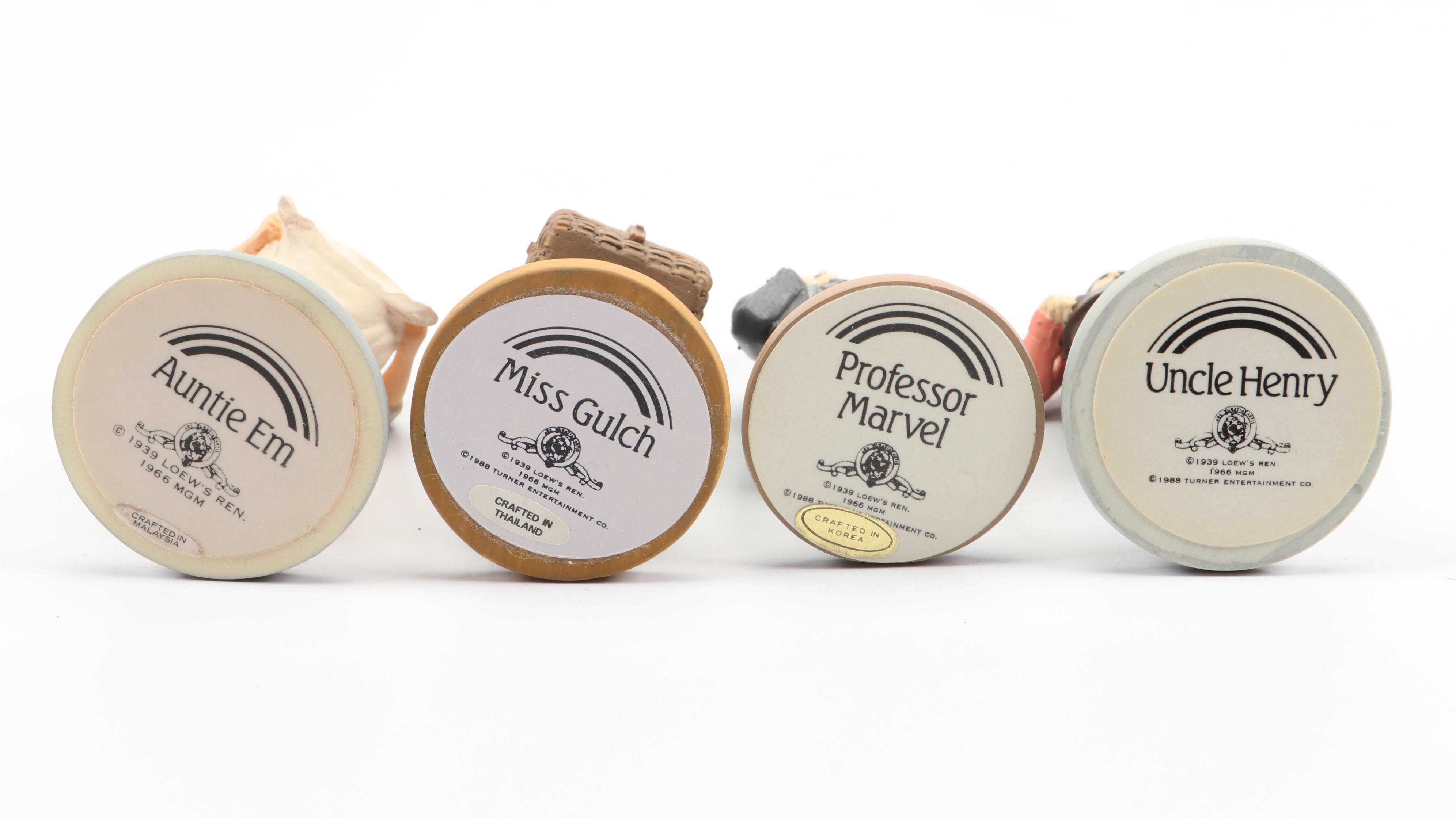 "Wizard of Oz" Figurines and Display Cabinet including "Tin Man" and "Auntie Em"