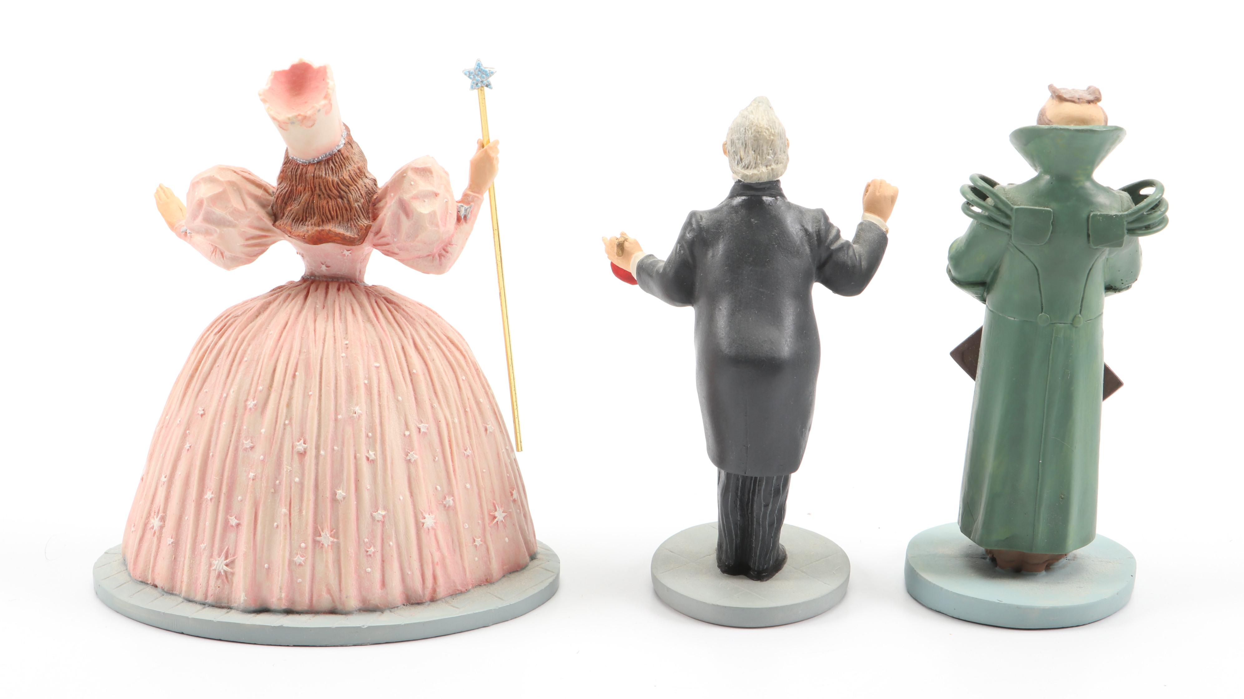 "Wizard of Oz" Figurines and Display Cabinet including "Tin Man" and "Auntie Em"