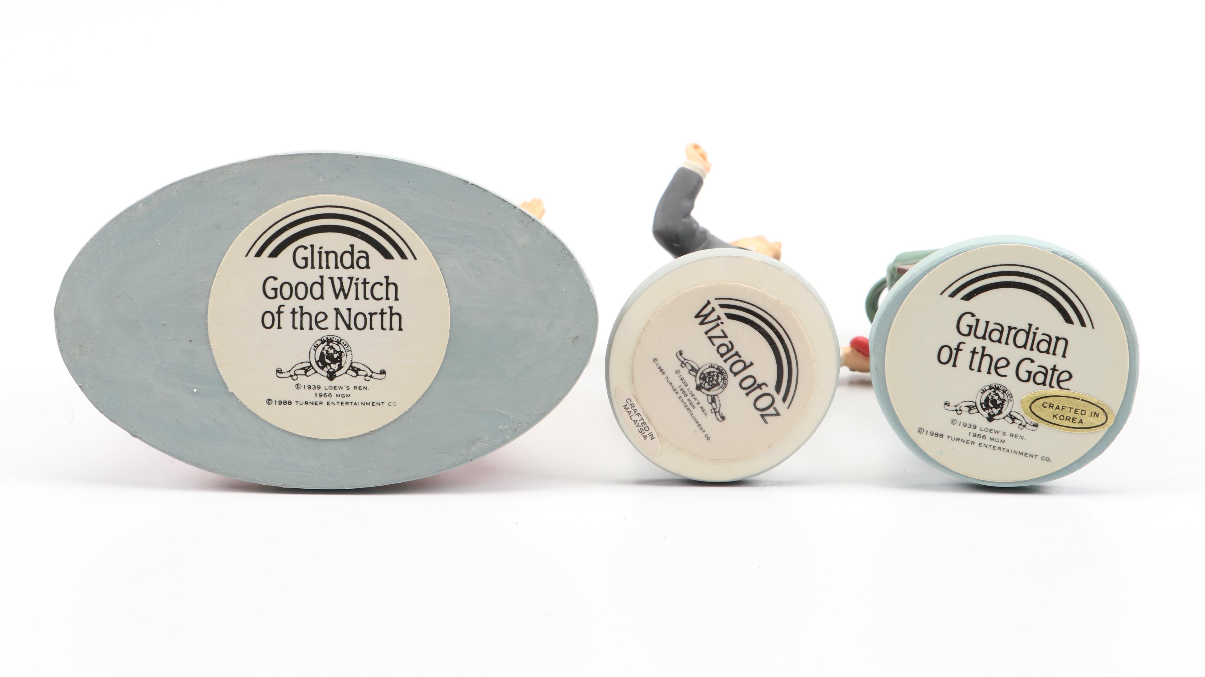 "Wizard of Oz" Figurines and Display Cabinet including "Tin Man" and "Auntie Em"