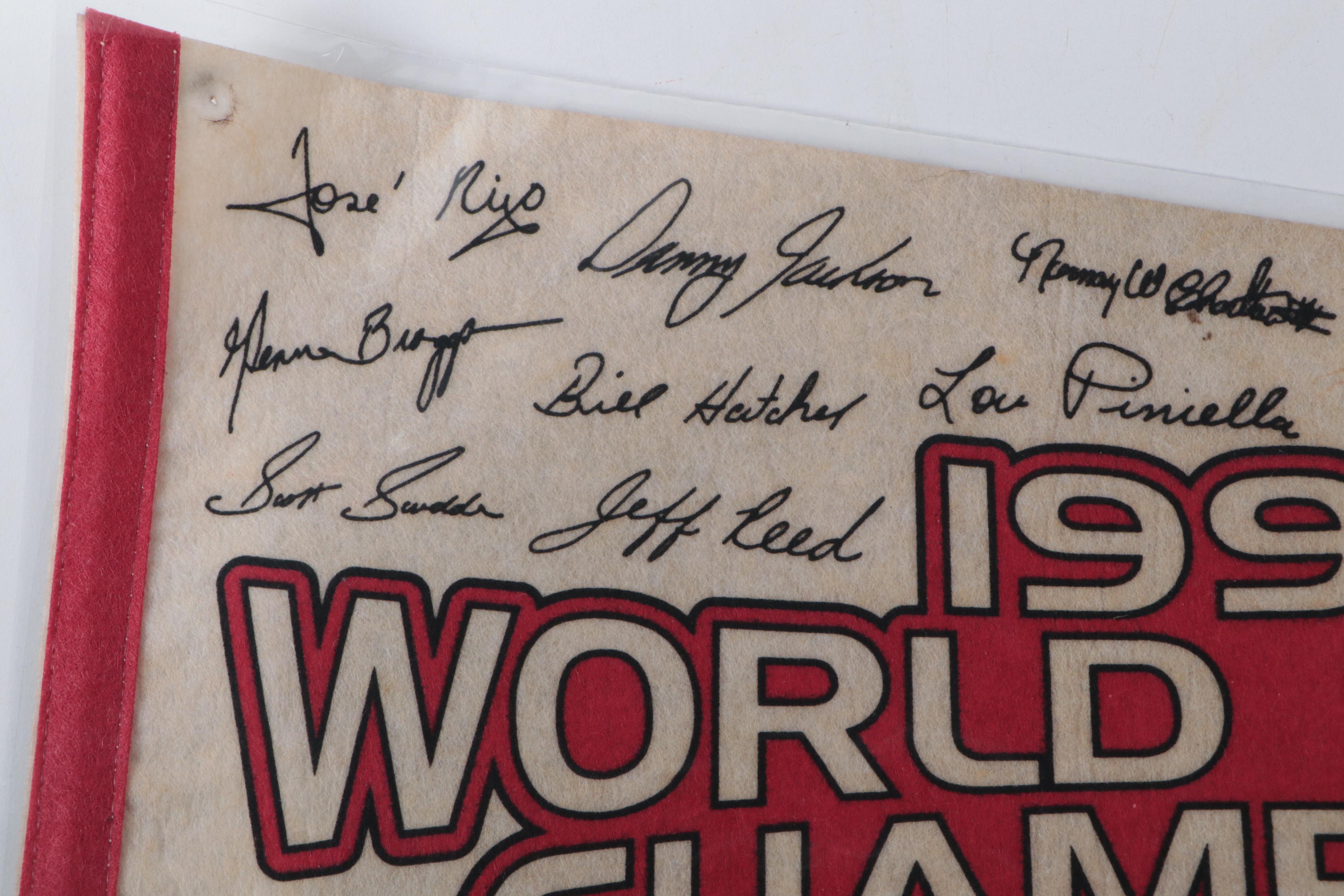 Barry Larkin Signed Rawlings Baseball with 1990 Cincinnati Reds Pennants