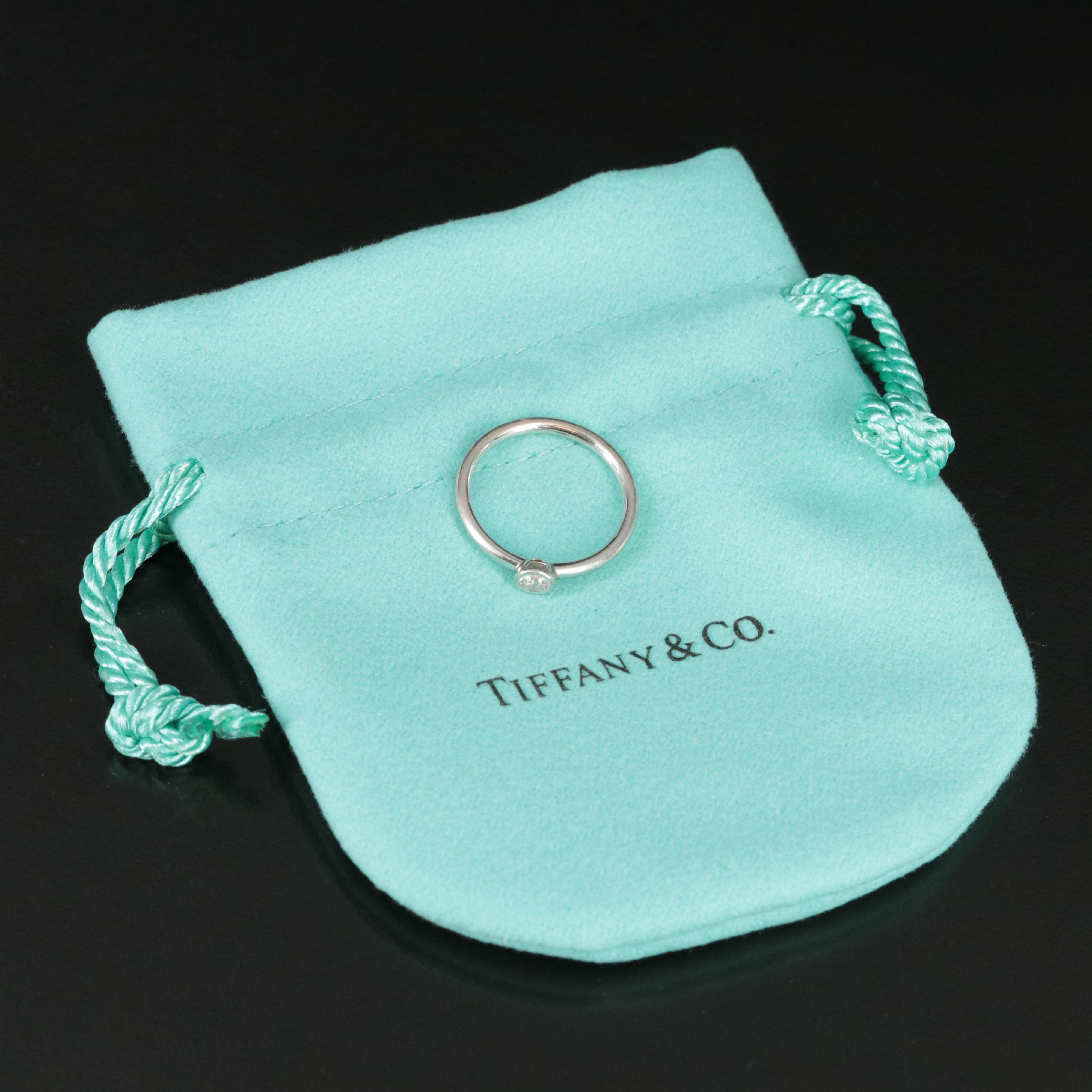 Tiffany & Co. Bezet Platinum Diamond Solitaire Ring