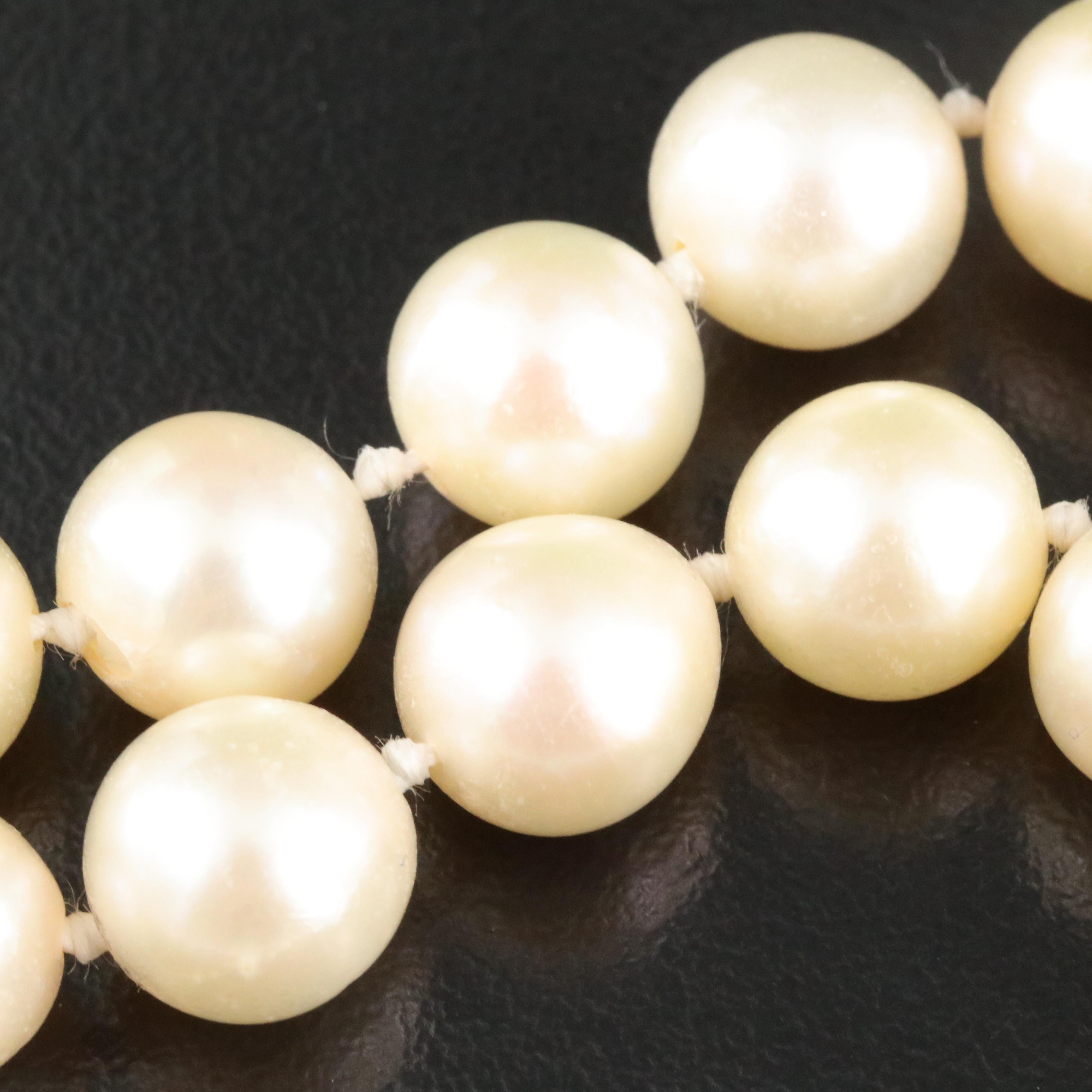 Pearl Necklace with 18k and 14K Two Tone Diamond and Ruby Clasp