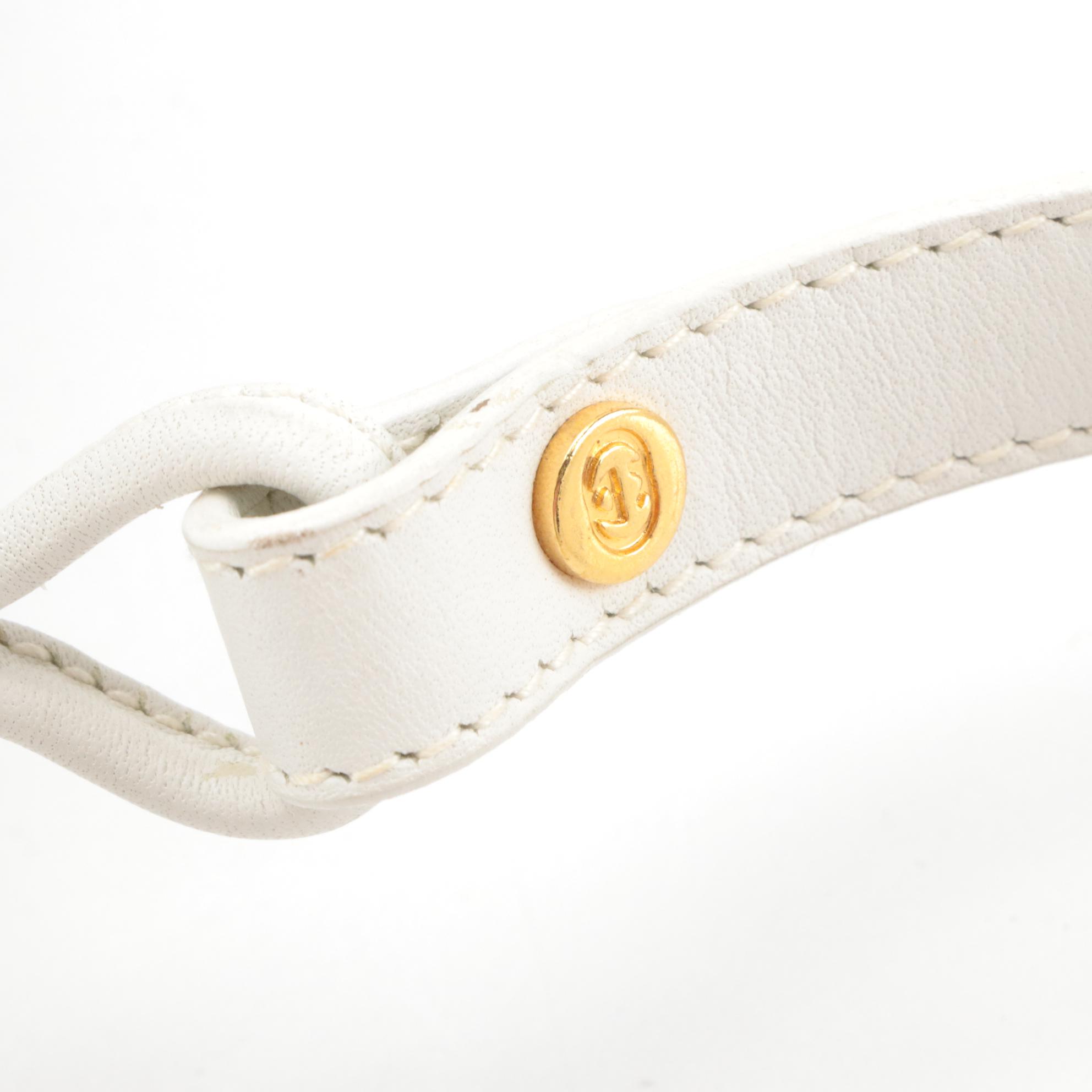 Gucci Drawstring Bucket Crossbody Bag in Flora Print Canvas and White Leather