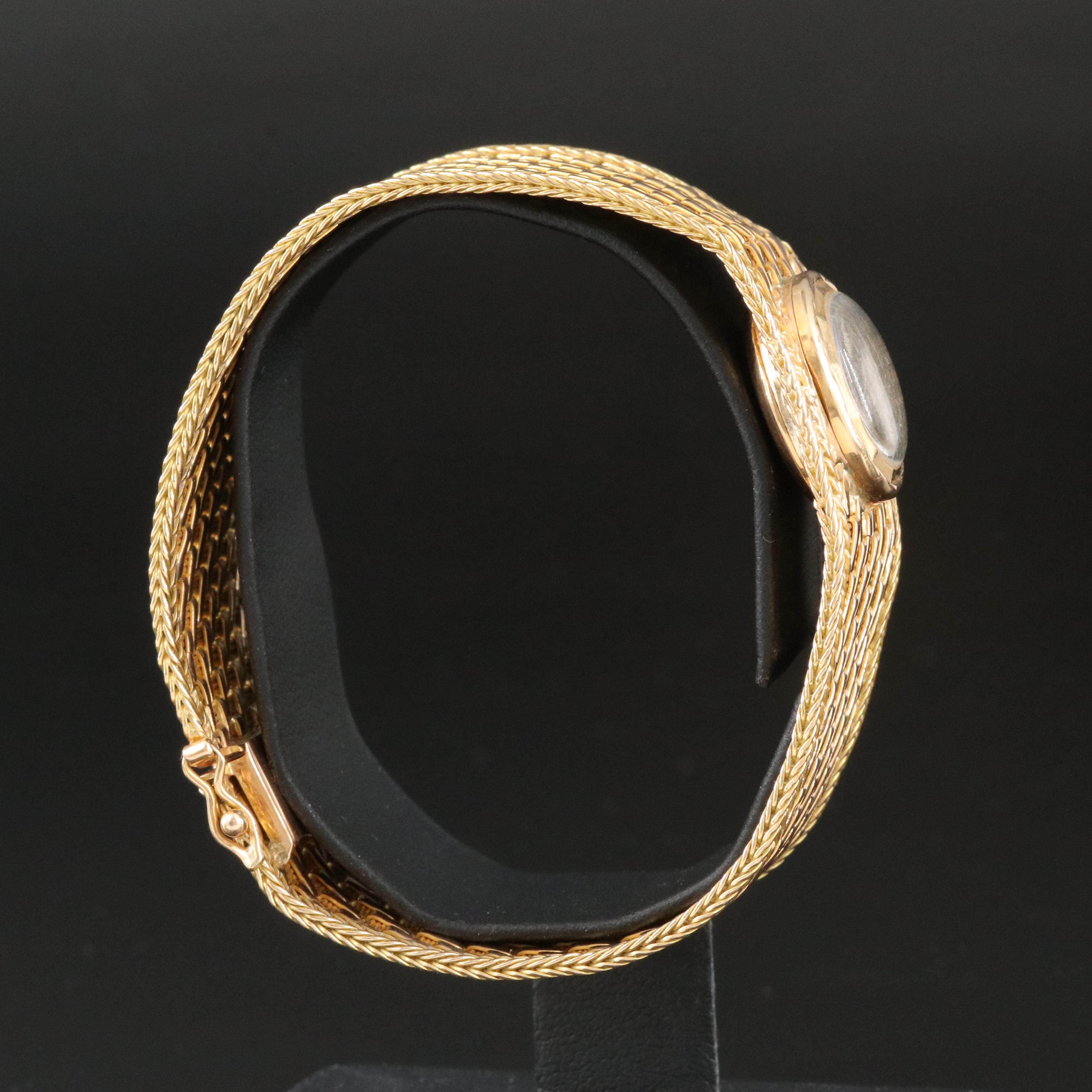 Tressa 18K Gold Basket Weave Bracelet Watch